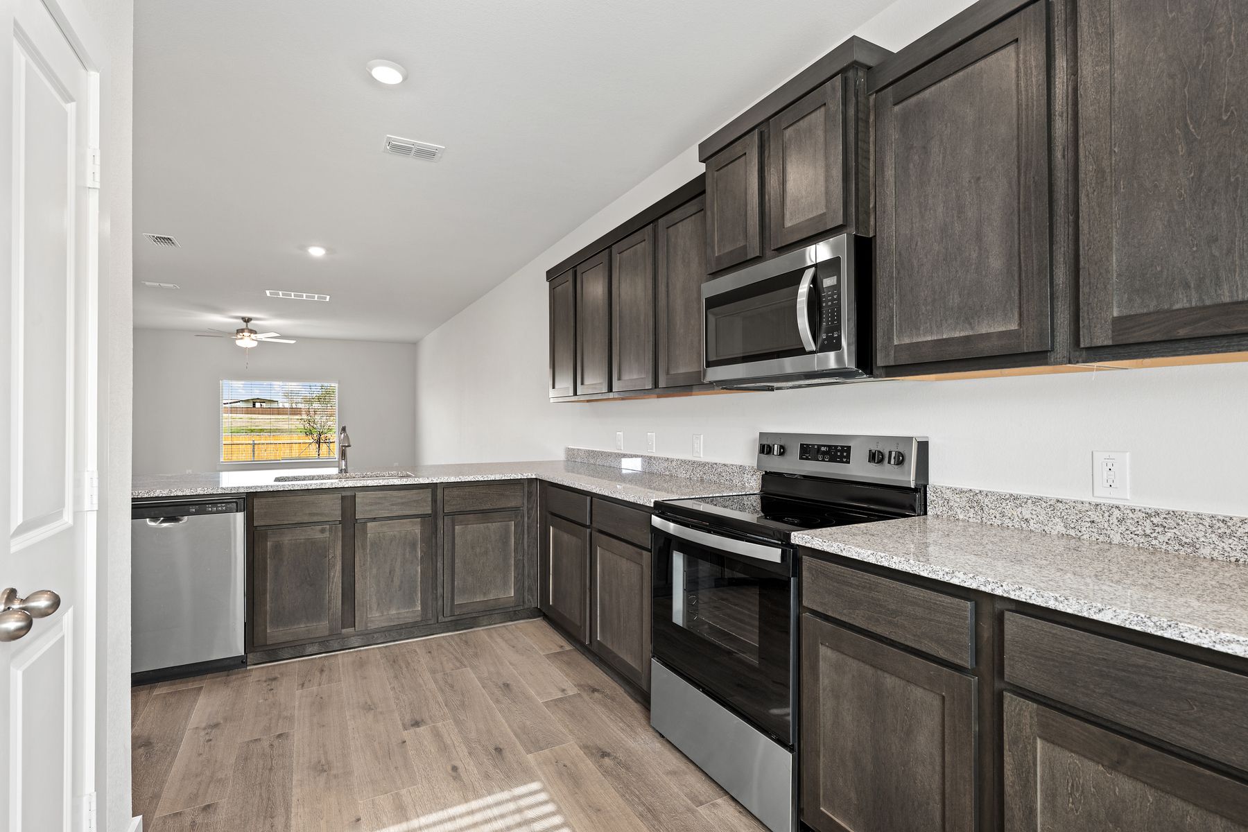 The kitchen has stainless-steel, energy-efficient appliances.