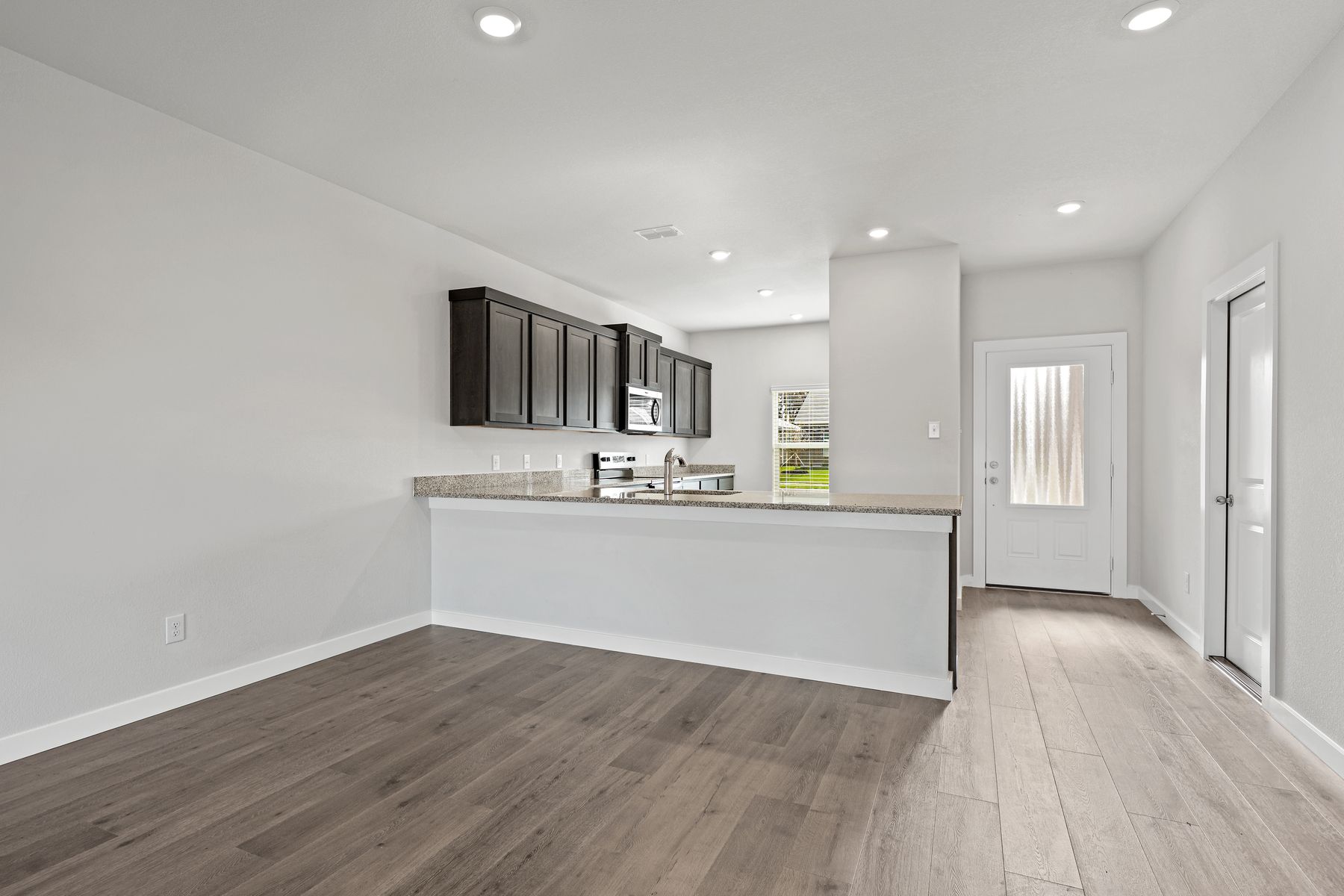 The dining room sits right off of the kitchen.