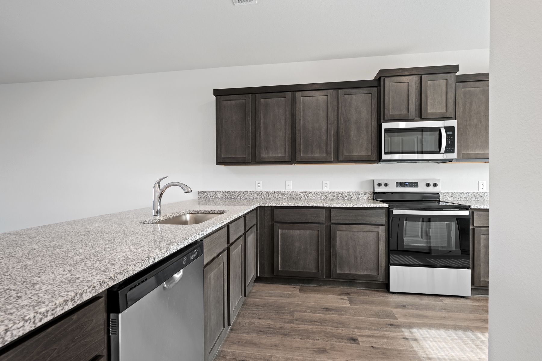 The kitchen has a wonderful breakfast bar.