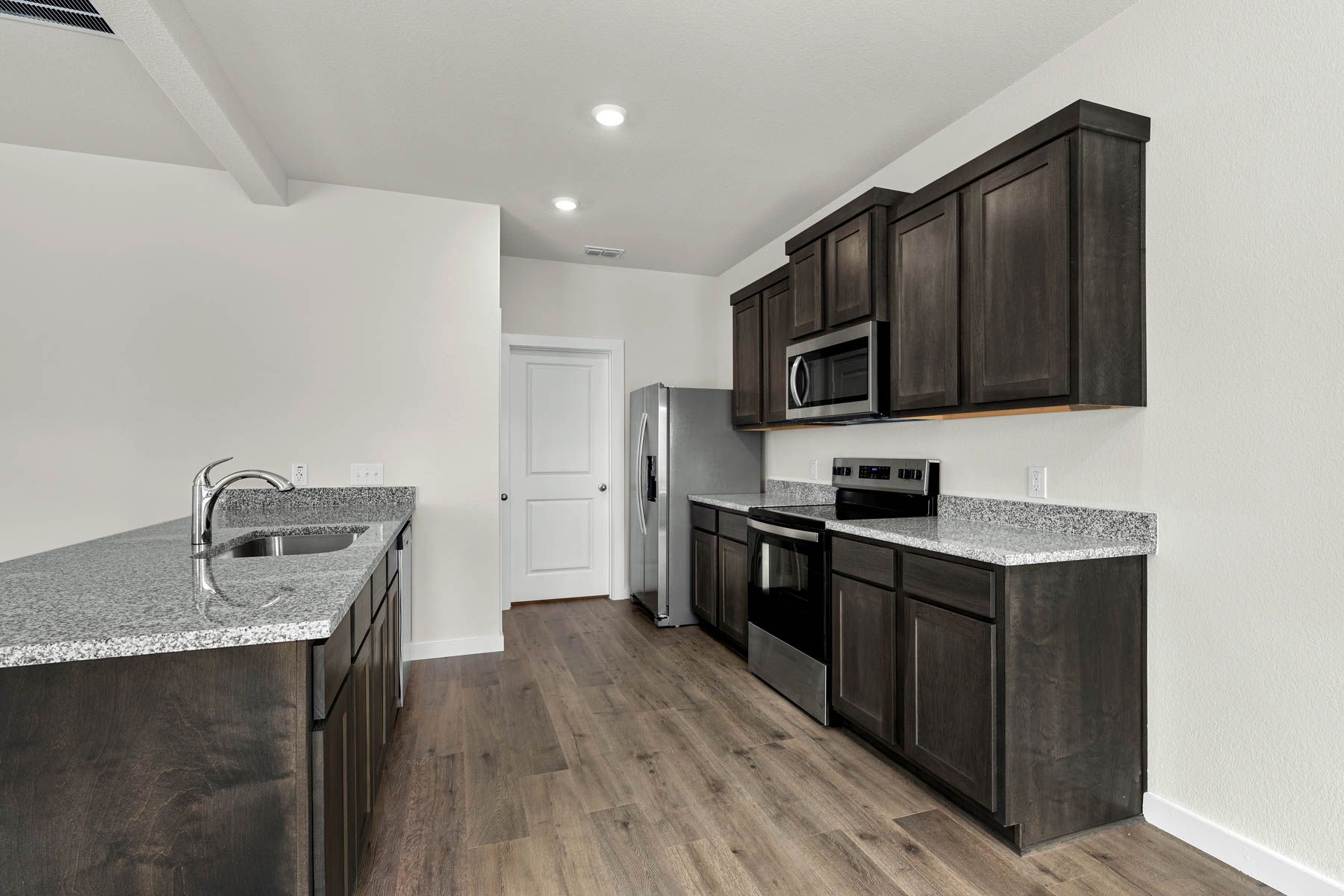 The kitchen has a wonderful breakfast bar.