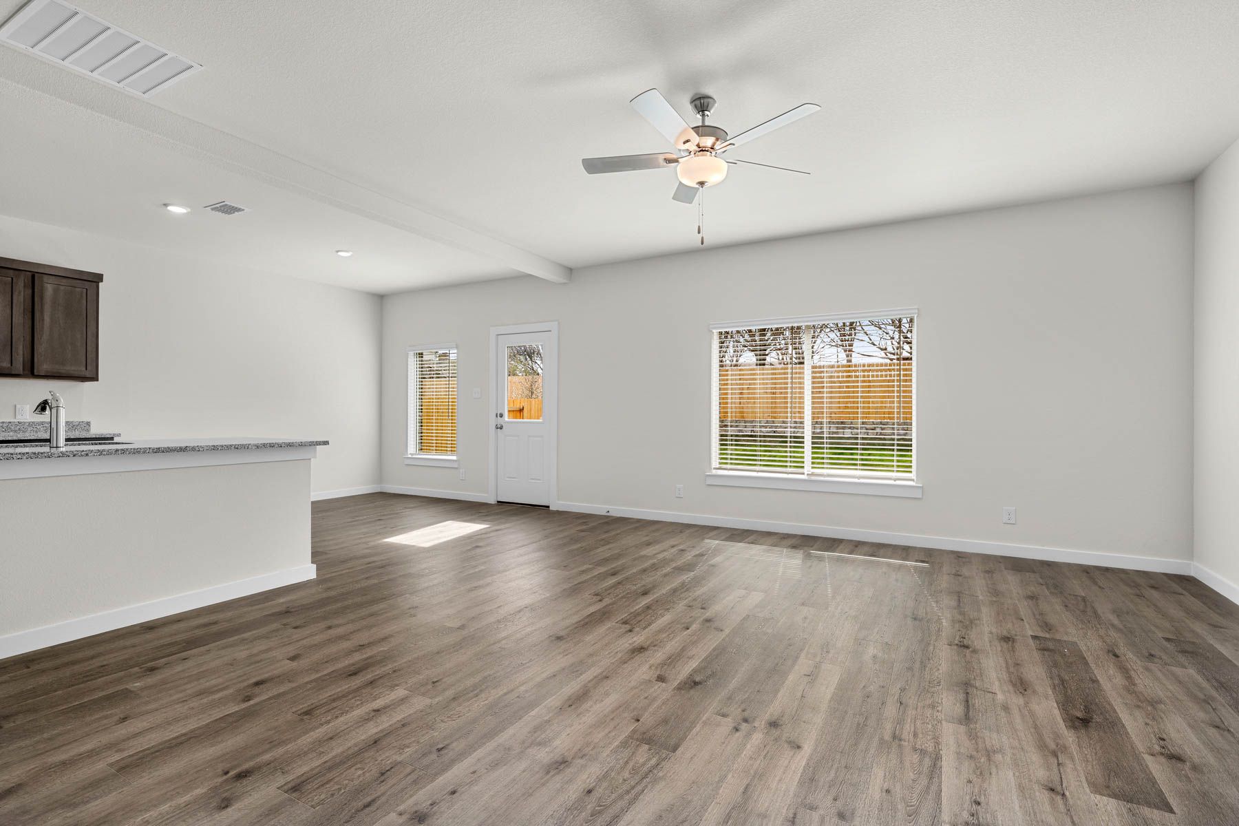 The living room sits right off of the kitchen and dining room.