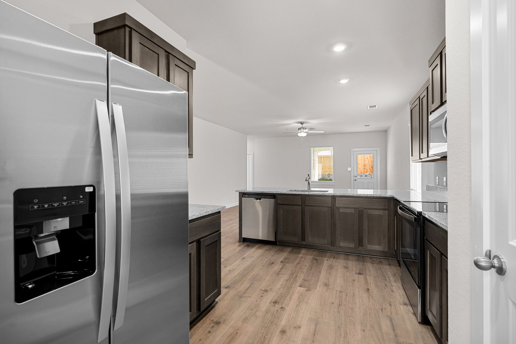 The kitchen has stainless-steel, energy-efficient appliances.