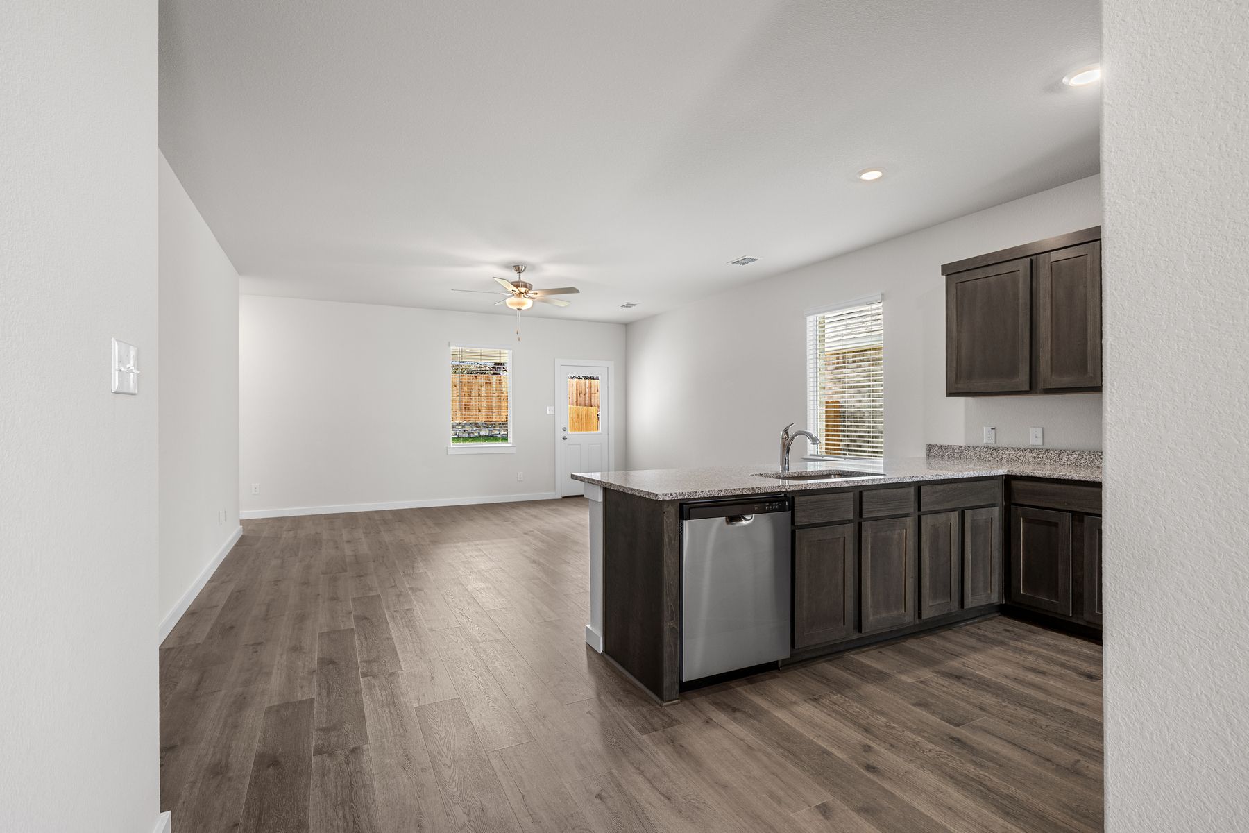 The living room sits right off of the kitchen.