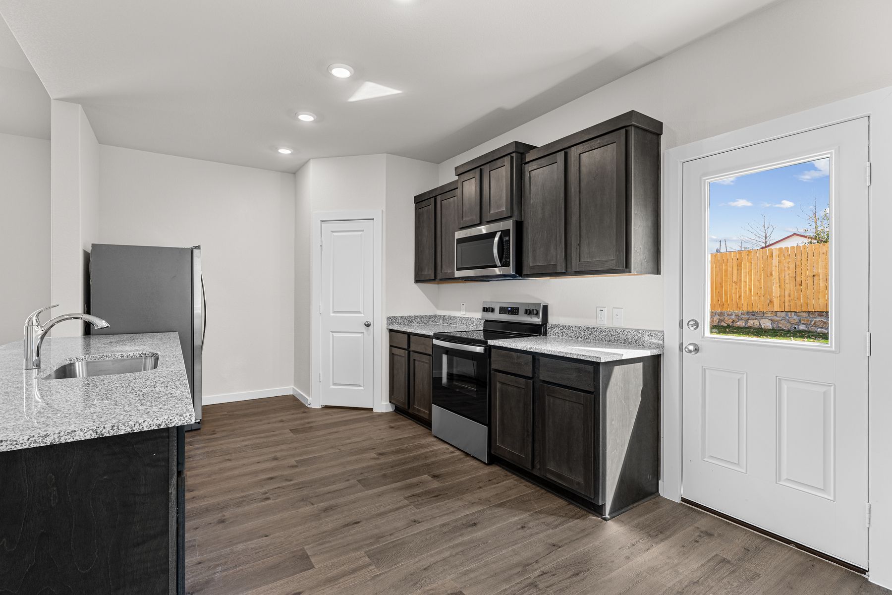 The kitchen has a wonderful breakfast bar.