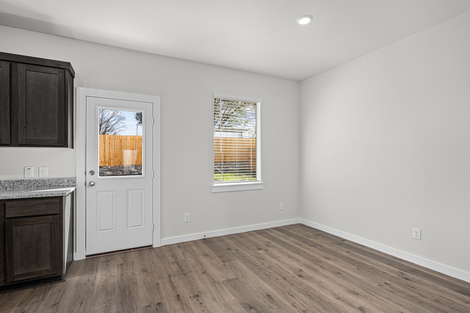 The dining room has a large window that lets in great, natural light.