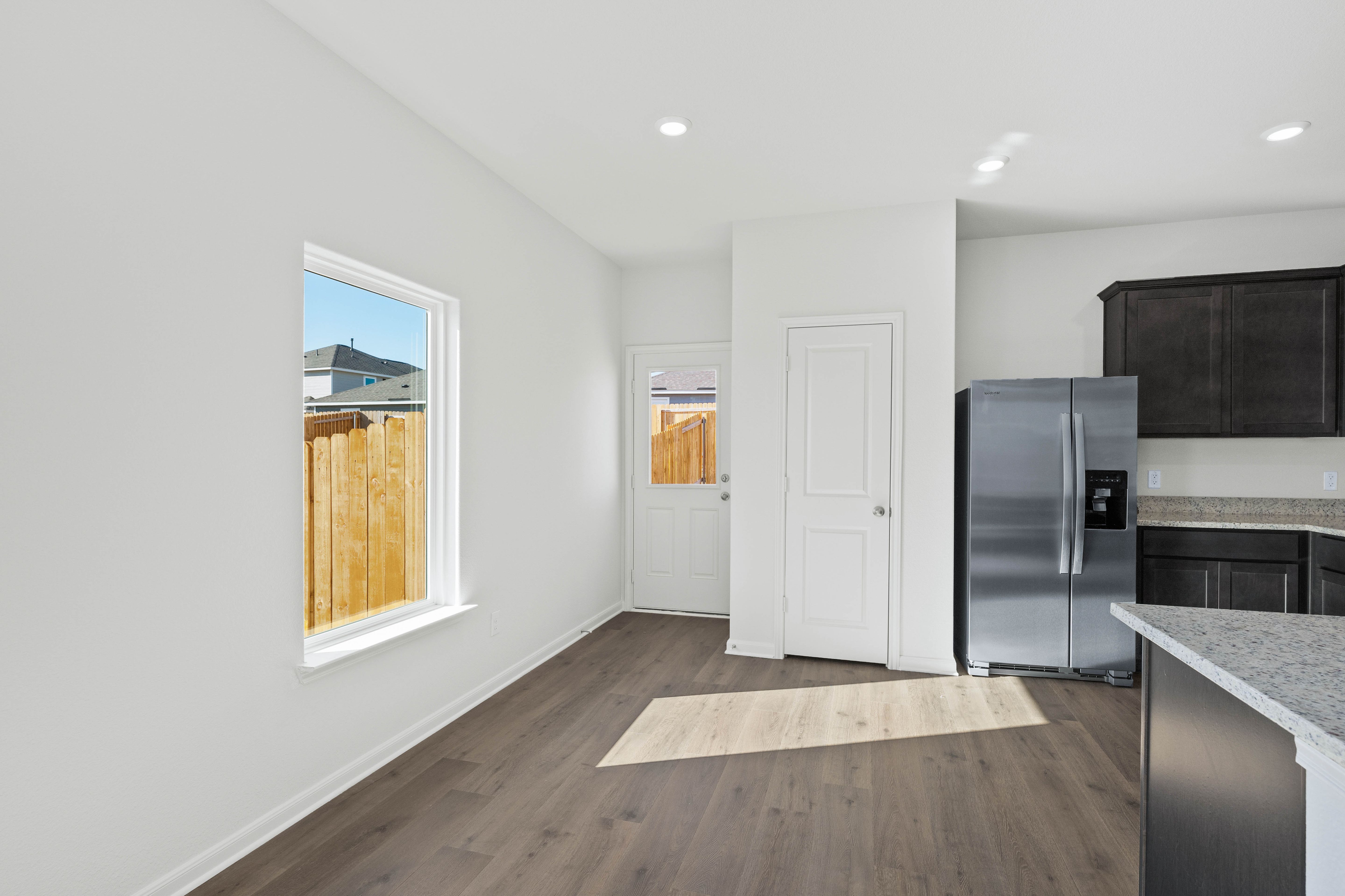 The dining area sits adjacent to the kitchen.