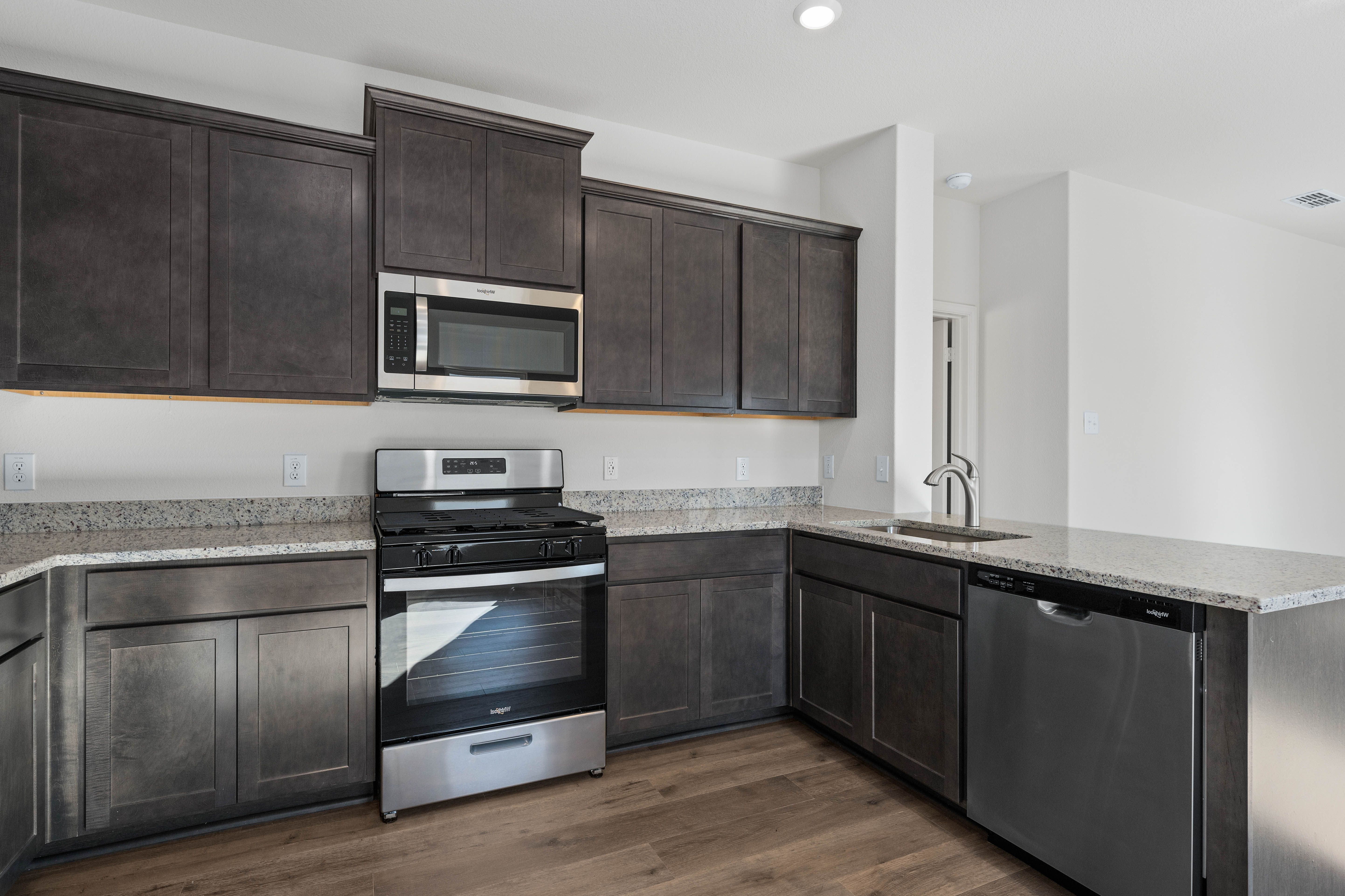 The kitchen has a wonderful breakfast bar.