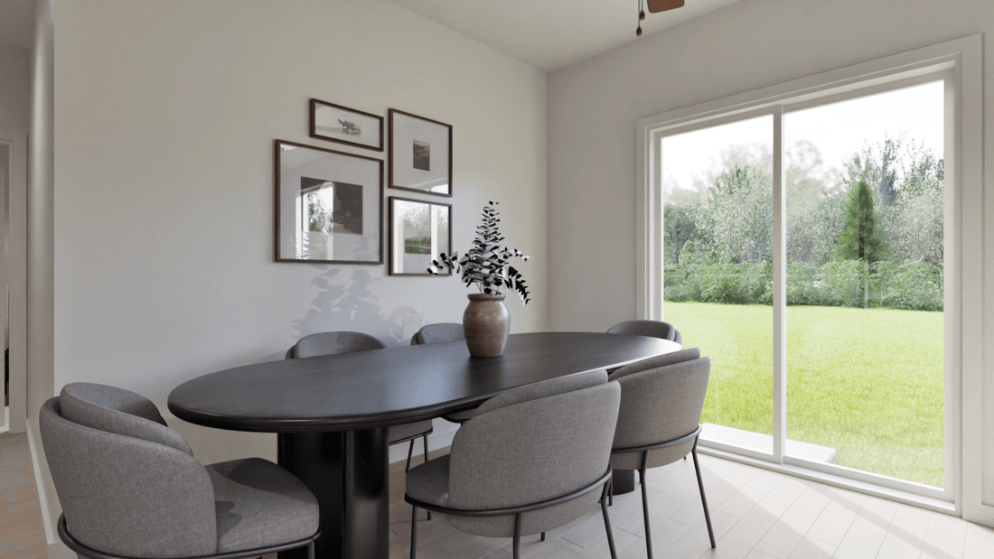 The dining room is spacious and open to the back yard.