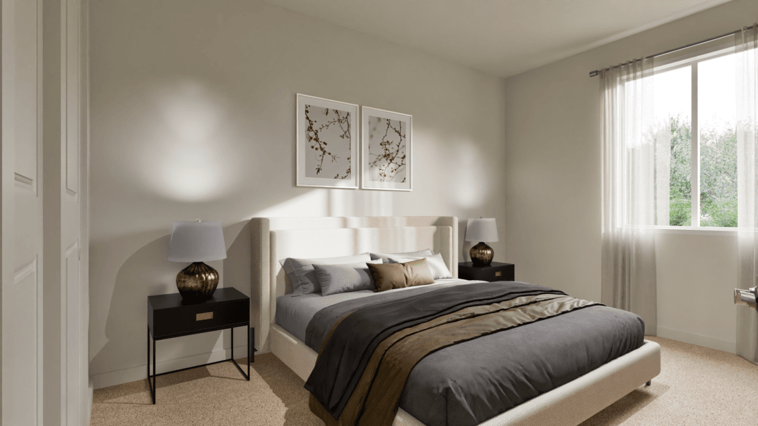 The master bedroom is spacious with a large window.