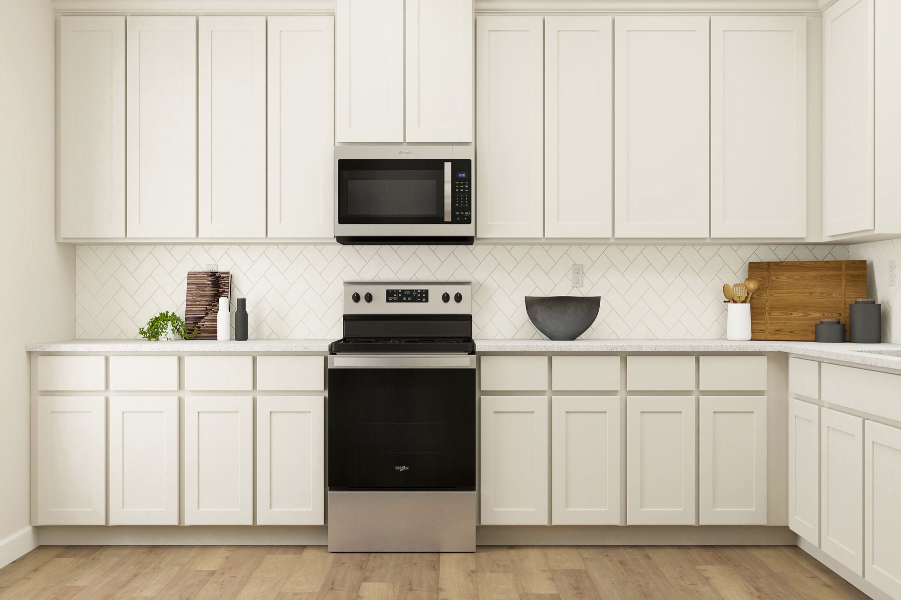 Rendering of the gorgeous kitchen with white cabinetry, herringbone tile backsplash,   stainless steel Whirlpool brand appliances and granite countertops.
