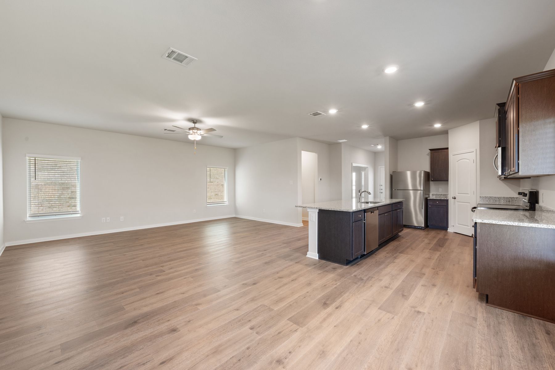 The living room sits right off of the kitchen and dining room.