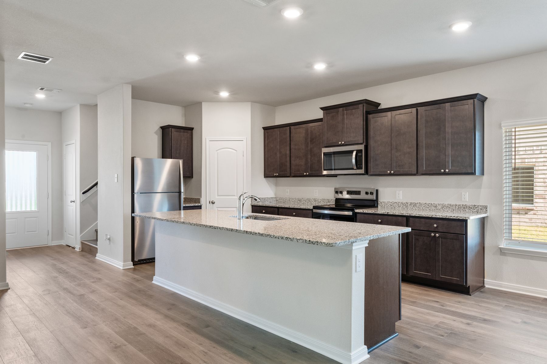 The upgraded kitchen has a convenient island.
