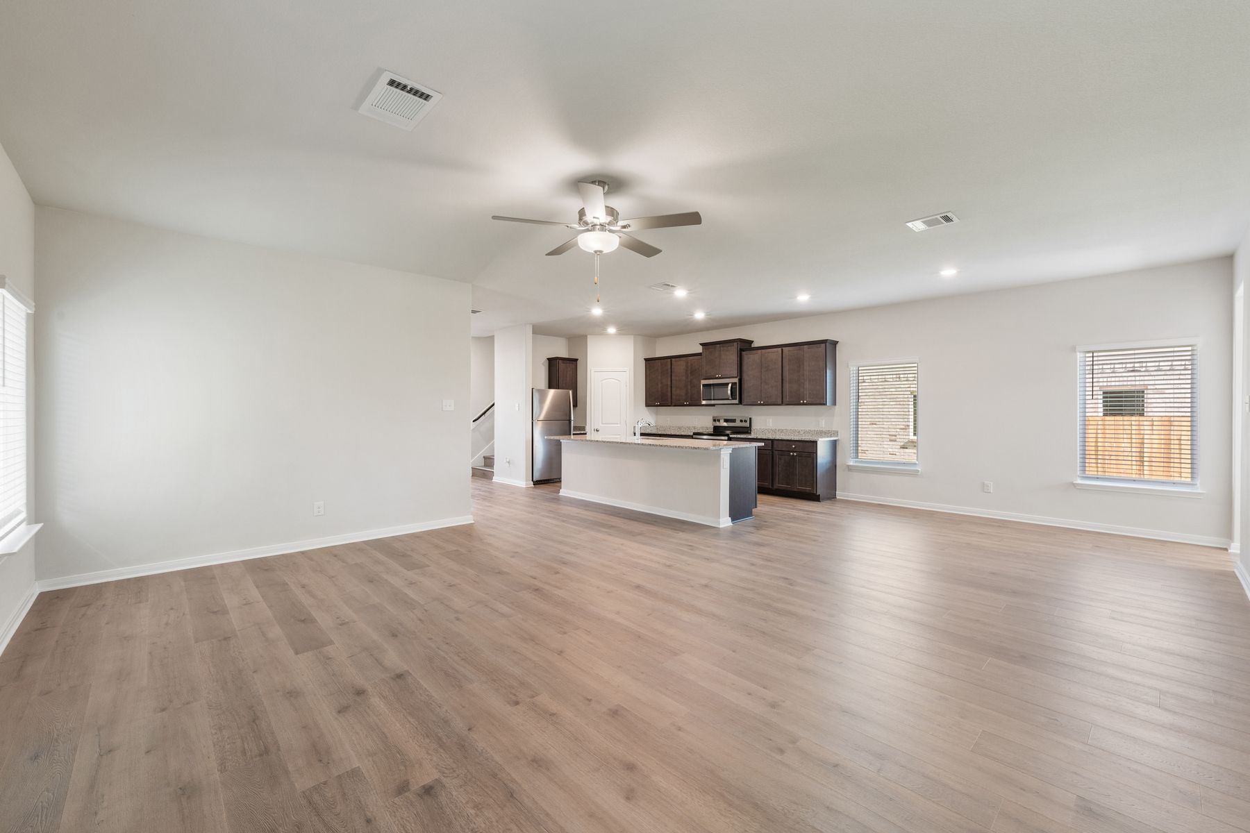 The living room sits right off of the kitchen and dining room.