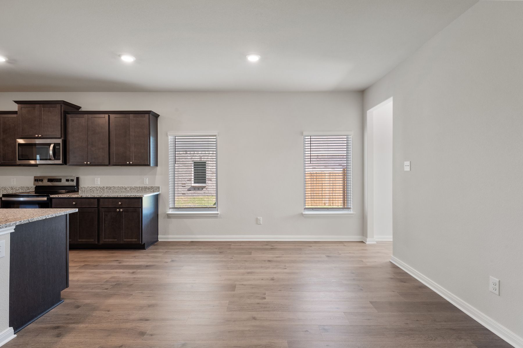 The dining room sits right off of the kitchen.
