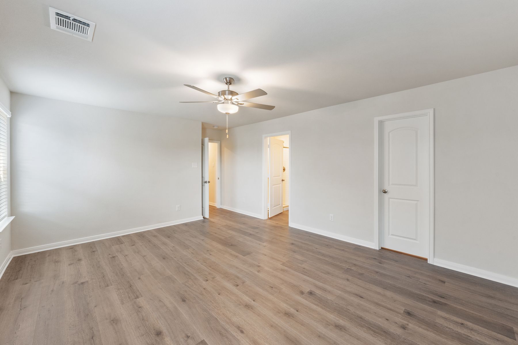 The master suite has a large room, ensuite bedroom, and walk-in closet.
