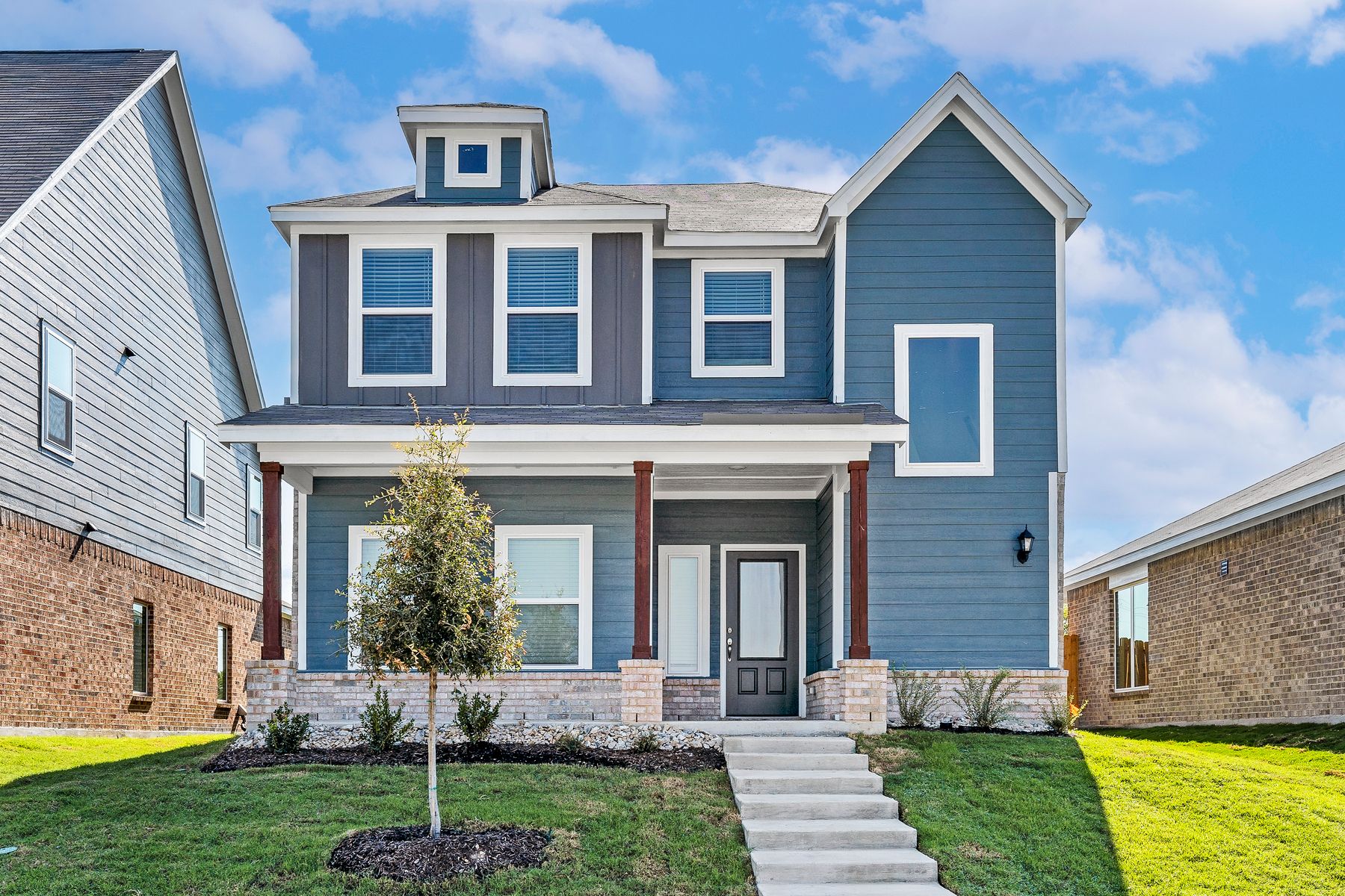 The Azalea is a beautiful two-story home.
