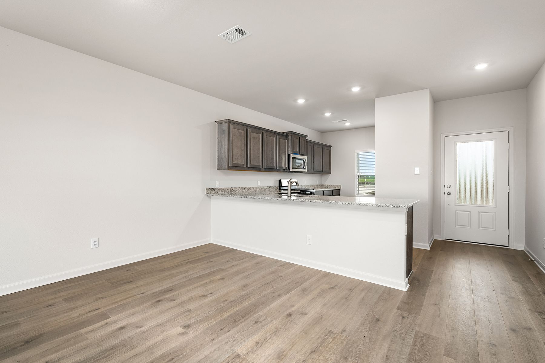 The dining room sits right off of the kitchen.