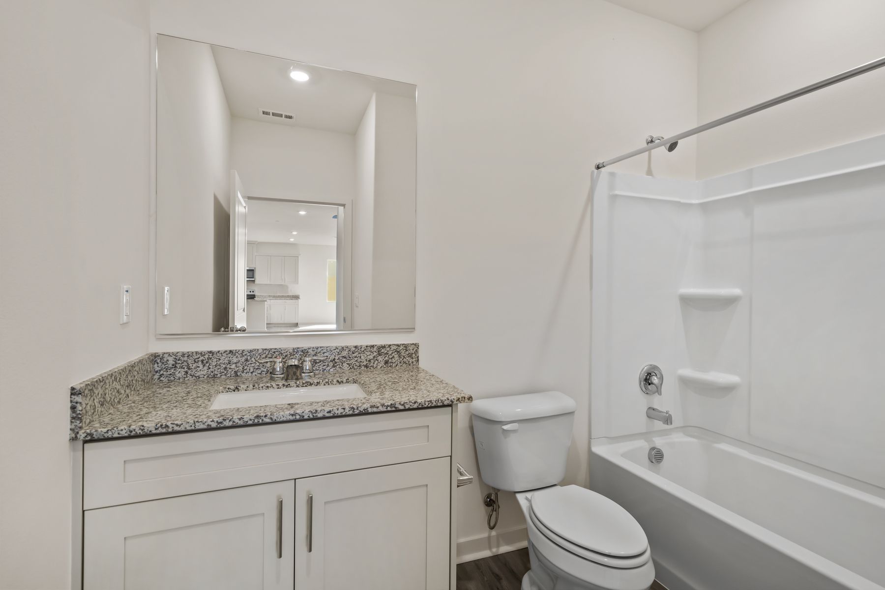 The secondary bathroom has the tub/shower combo.q