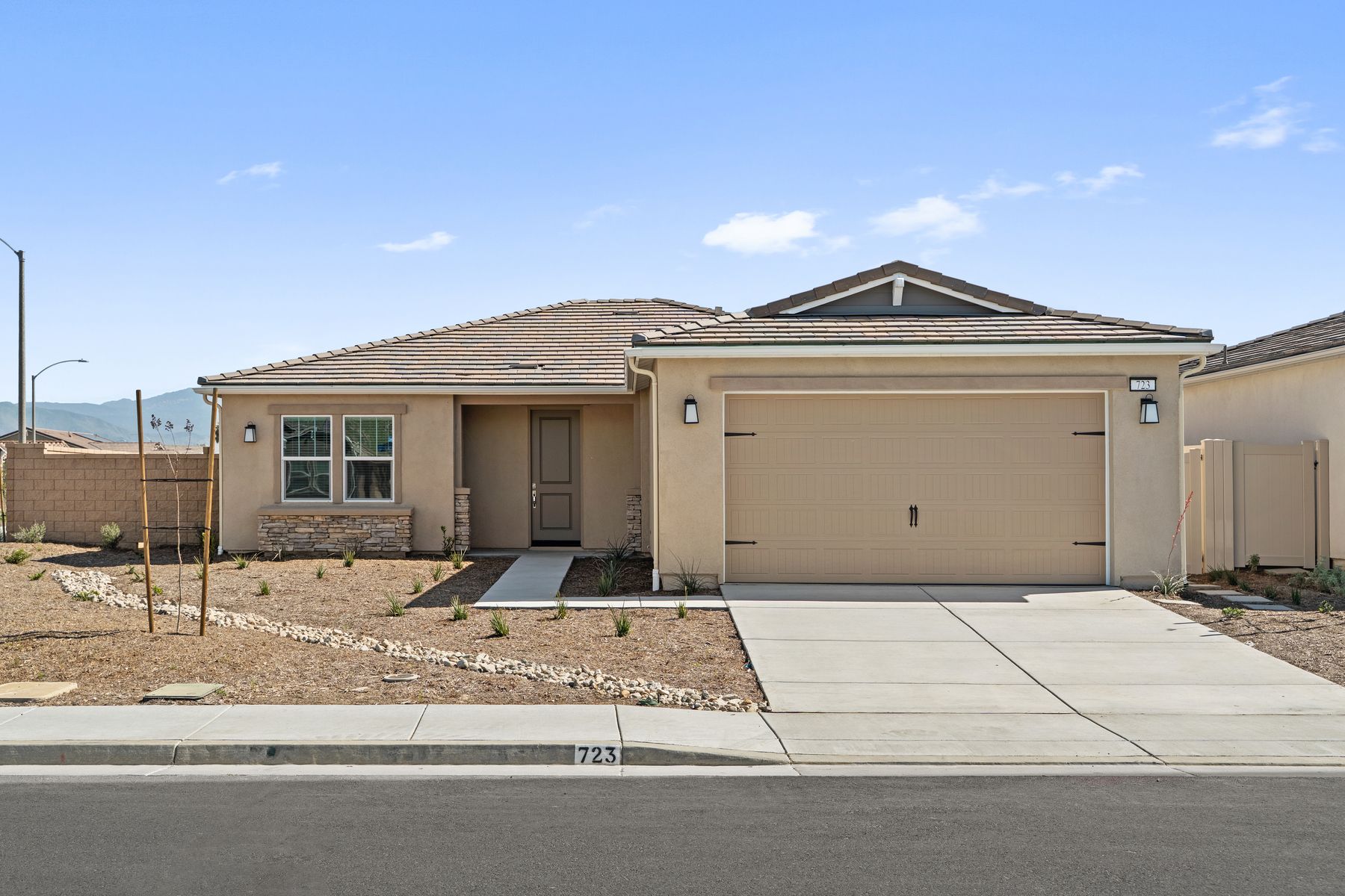 The Guadalupe is a beautiful single story home with stucco.