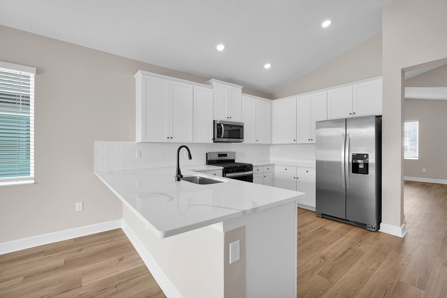 Each kitchen includes stainless steel appliances