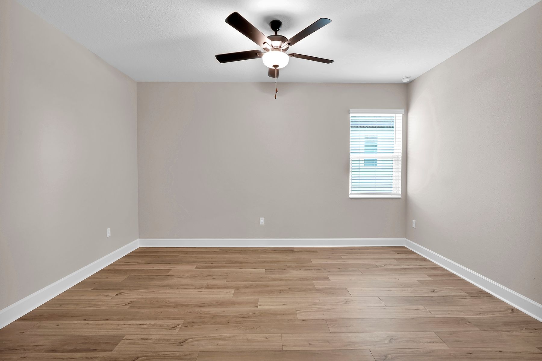 Rest and relaxation await in the master bedroom