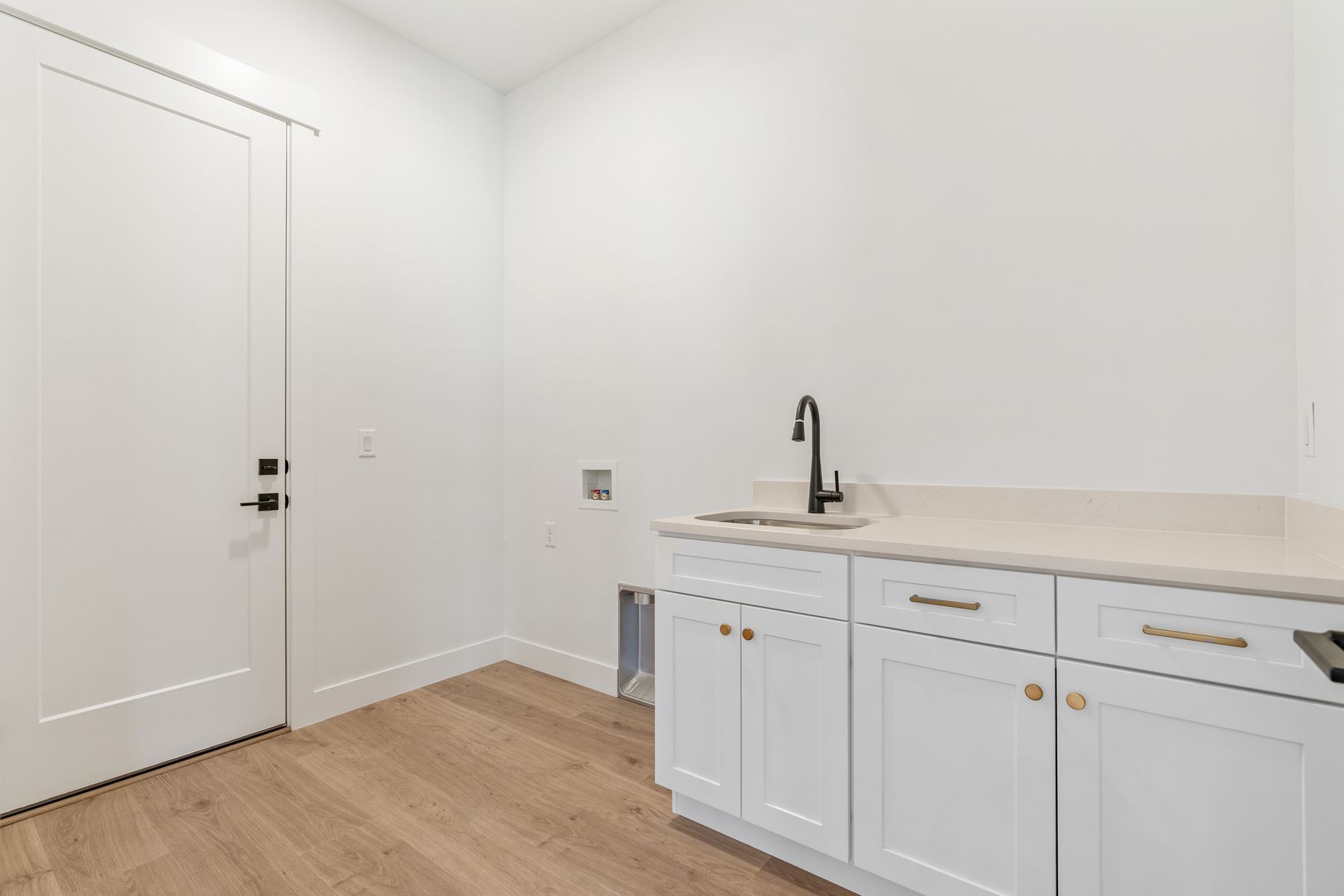 The laundry rooms have counterspace with a sink for convenience.