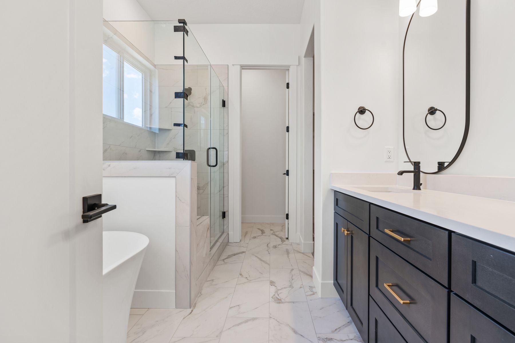 The master bathrooms have dual sink vanities.