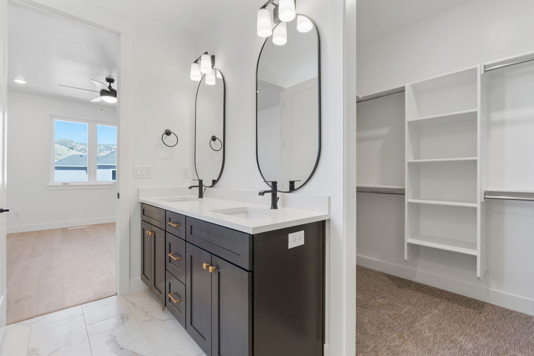 The walk-in closet is located in the master bathroom. 
