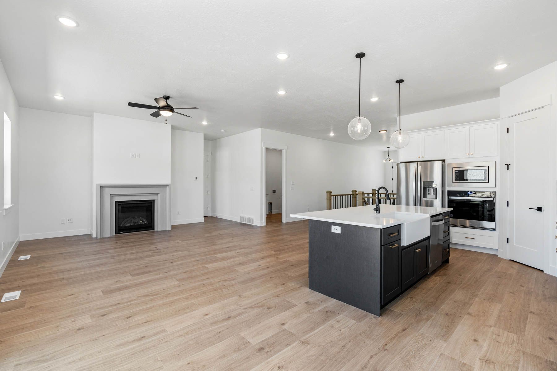 The family room is large and has lots of windows and a gas fireplace.