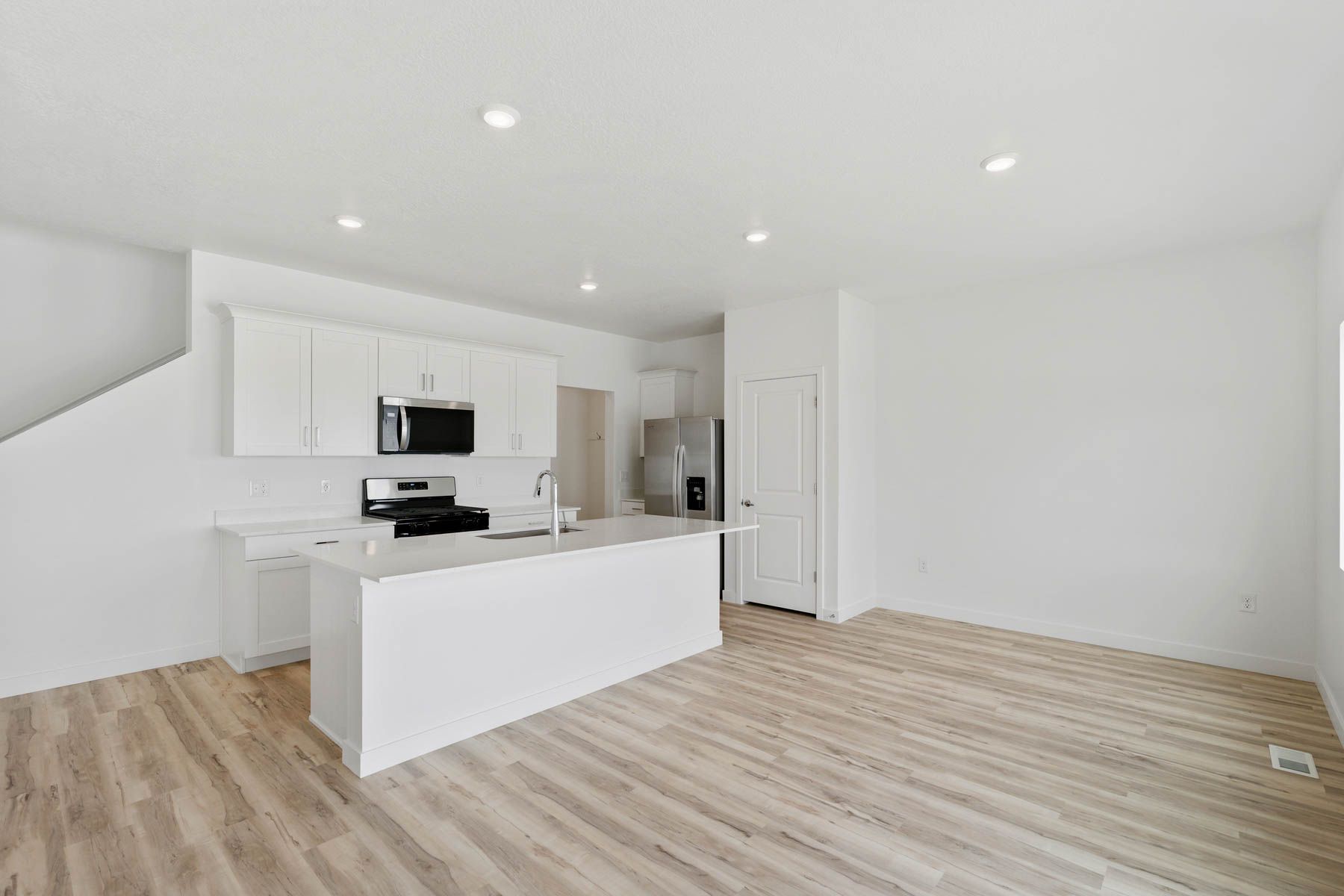 The kitchen has a wonderful kitchen island. 
