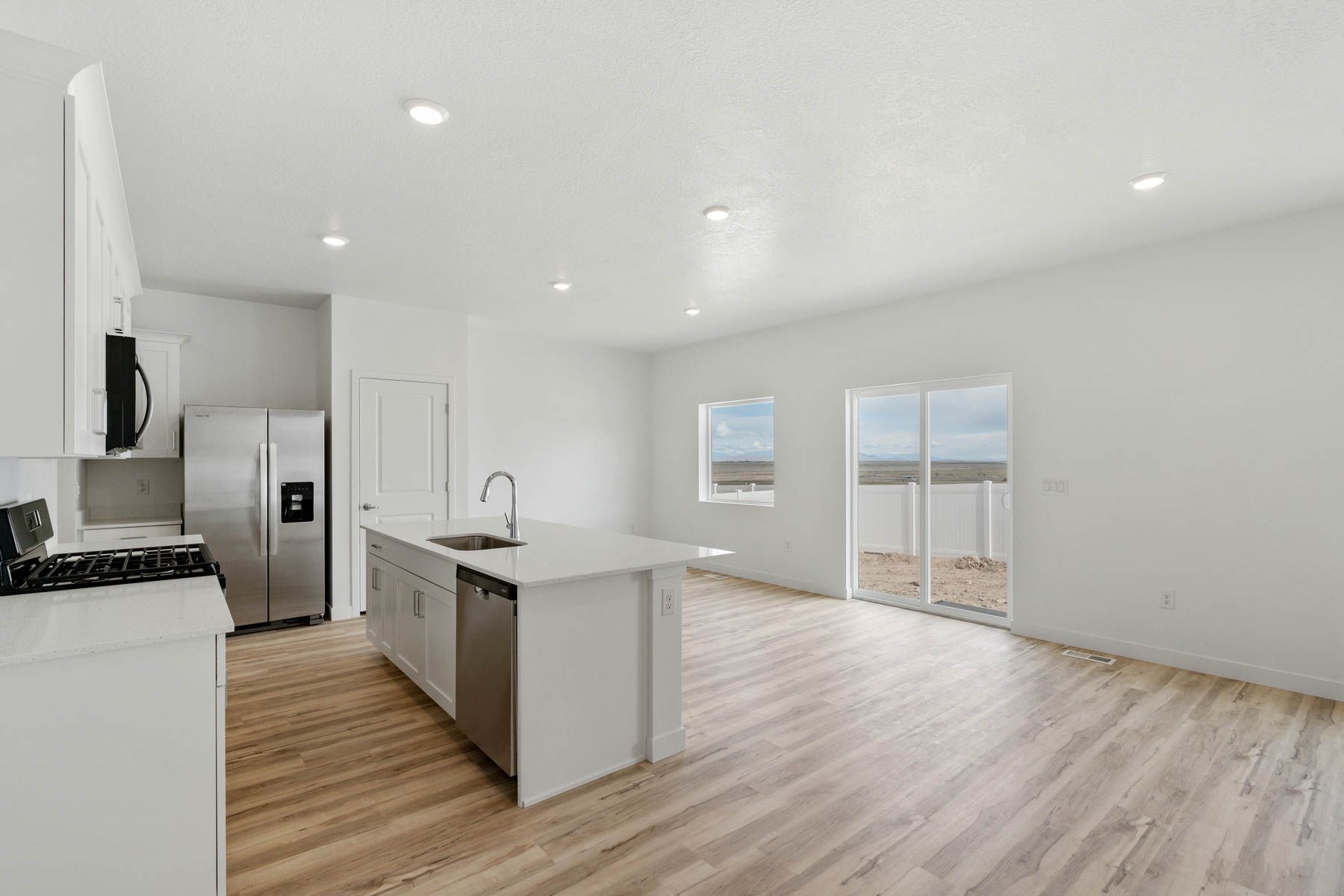 The living room sits right off of the dining room.