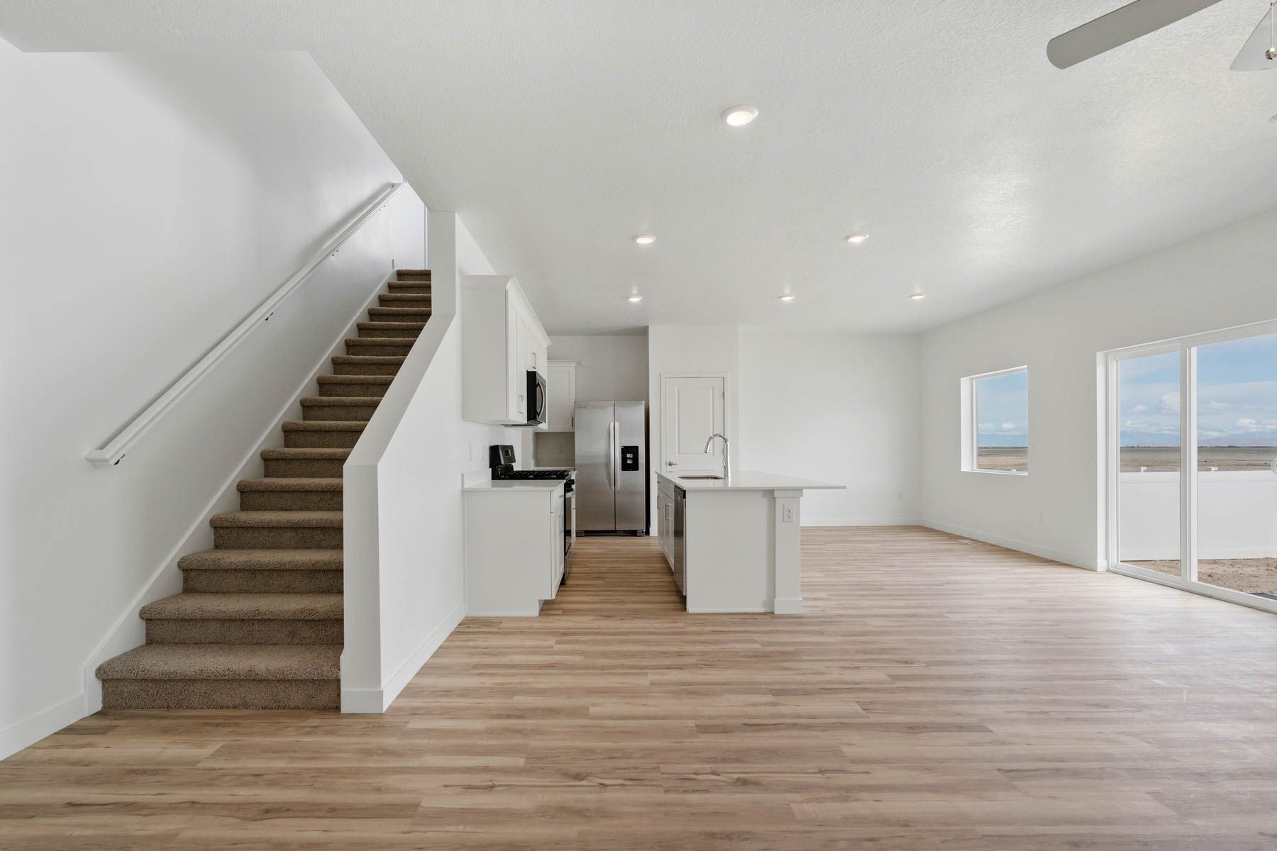 The family room is spacious for lots of furniture. 