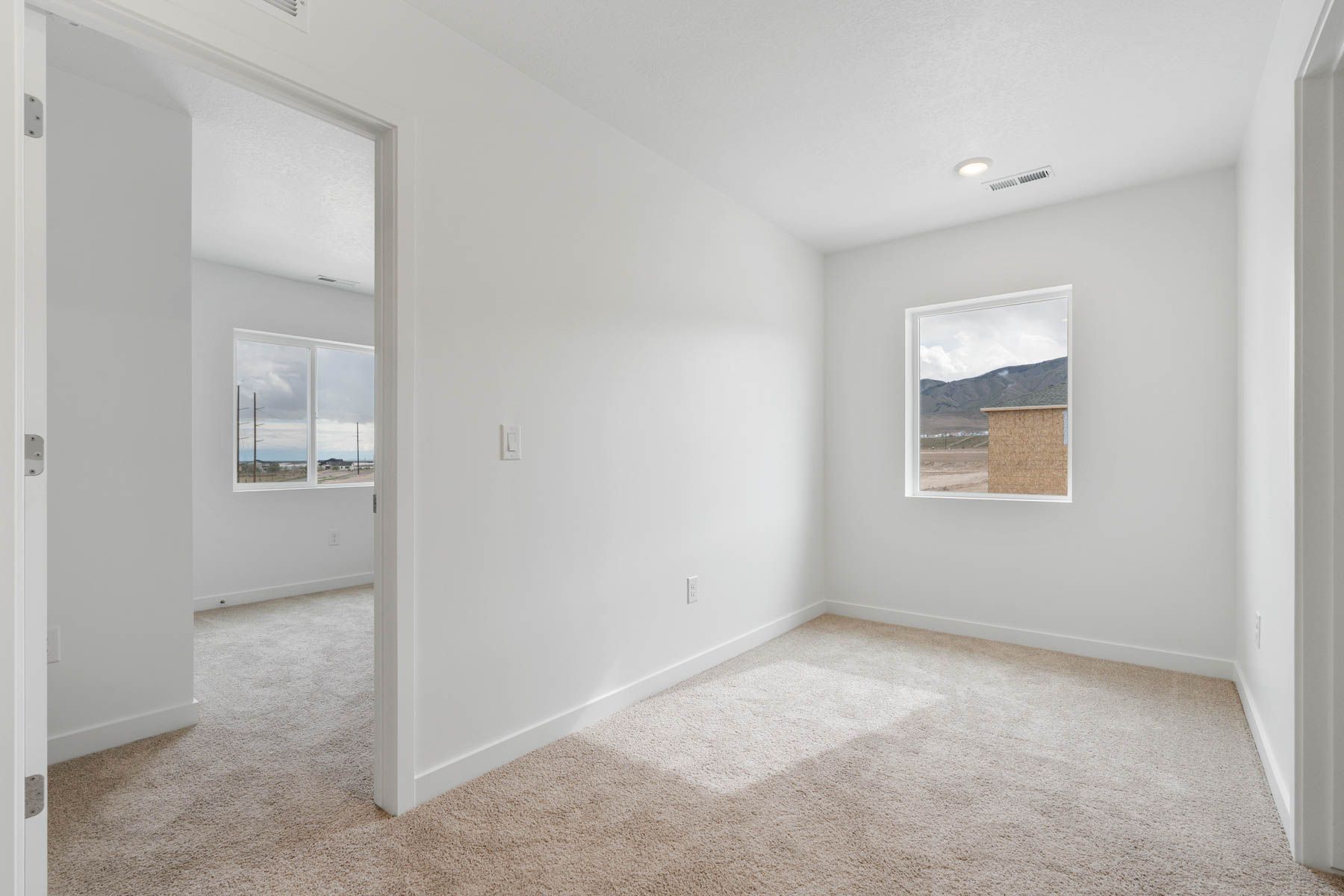 Upstairs, the loft is a versatile space.