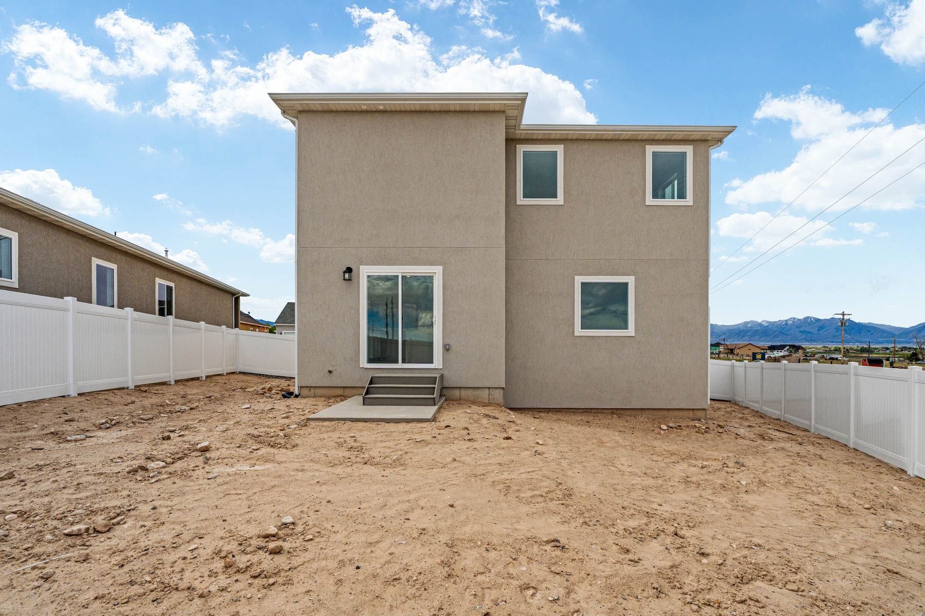 The Granite  has a fullly fenced-in back yard. 