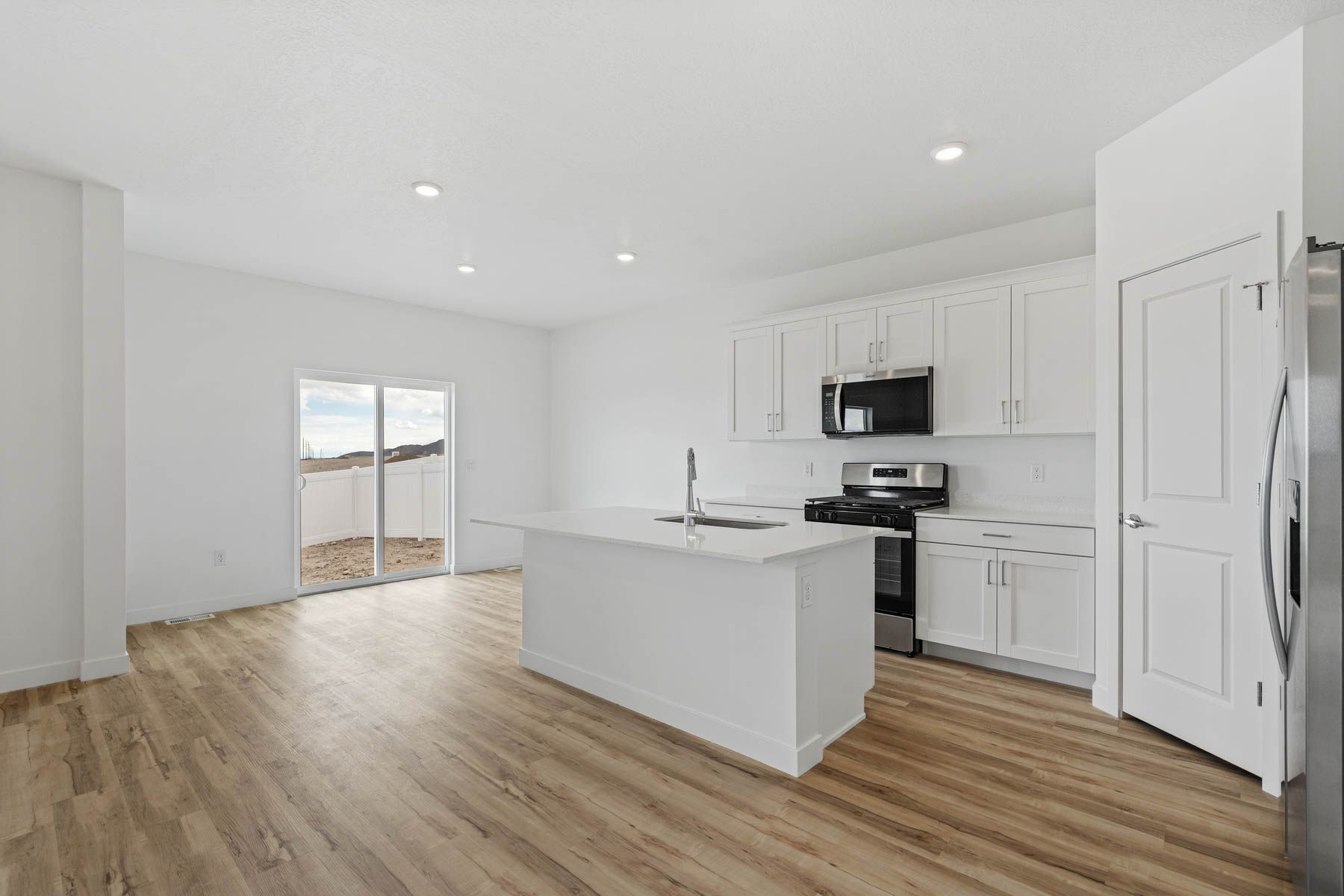 The kitchen has a wonderful kitchen island. 