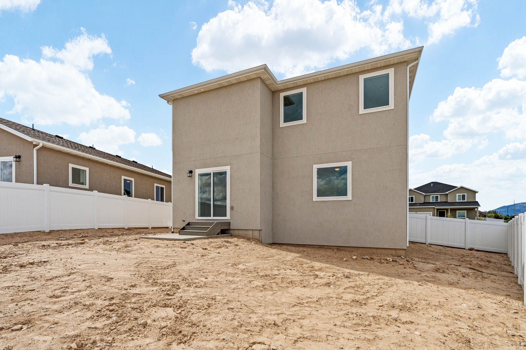 The Granite  has a fullly fenced-in back yard. 