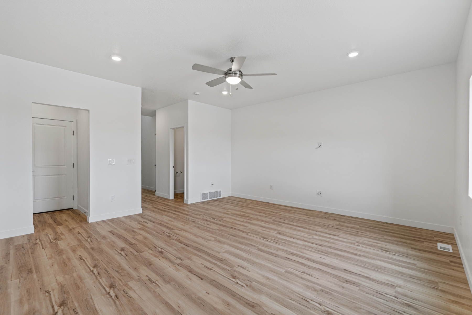 The spacious family room is the perfect space to gather with family and friends.