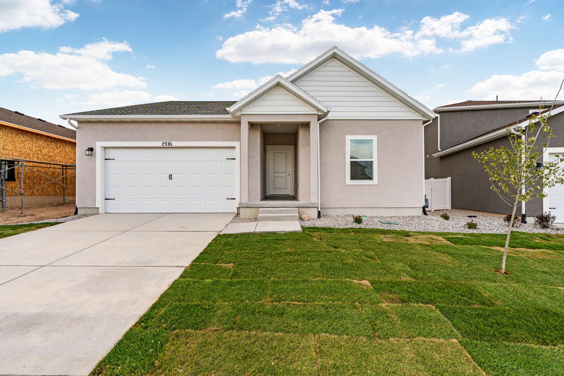 The Millard has a stucco exterior with siding exterior.
