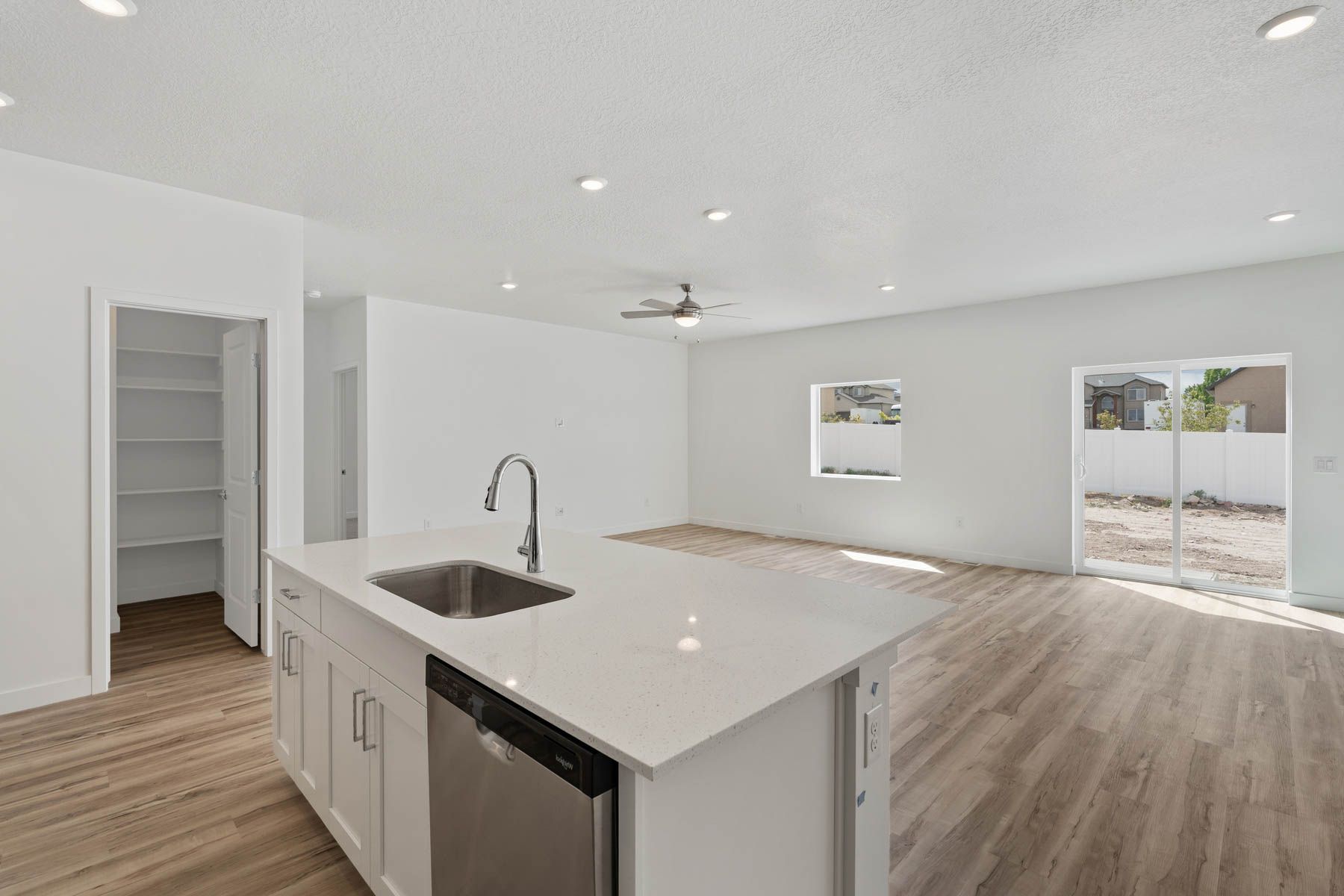 The kitchen has beautiful wood cabinetry.