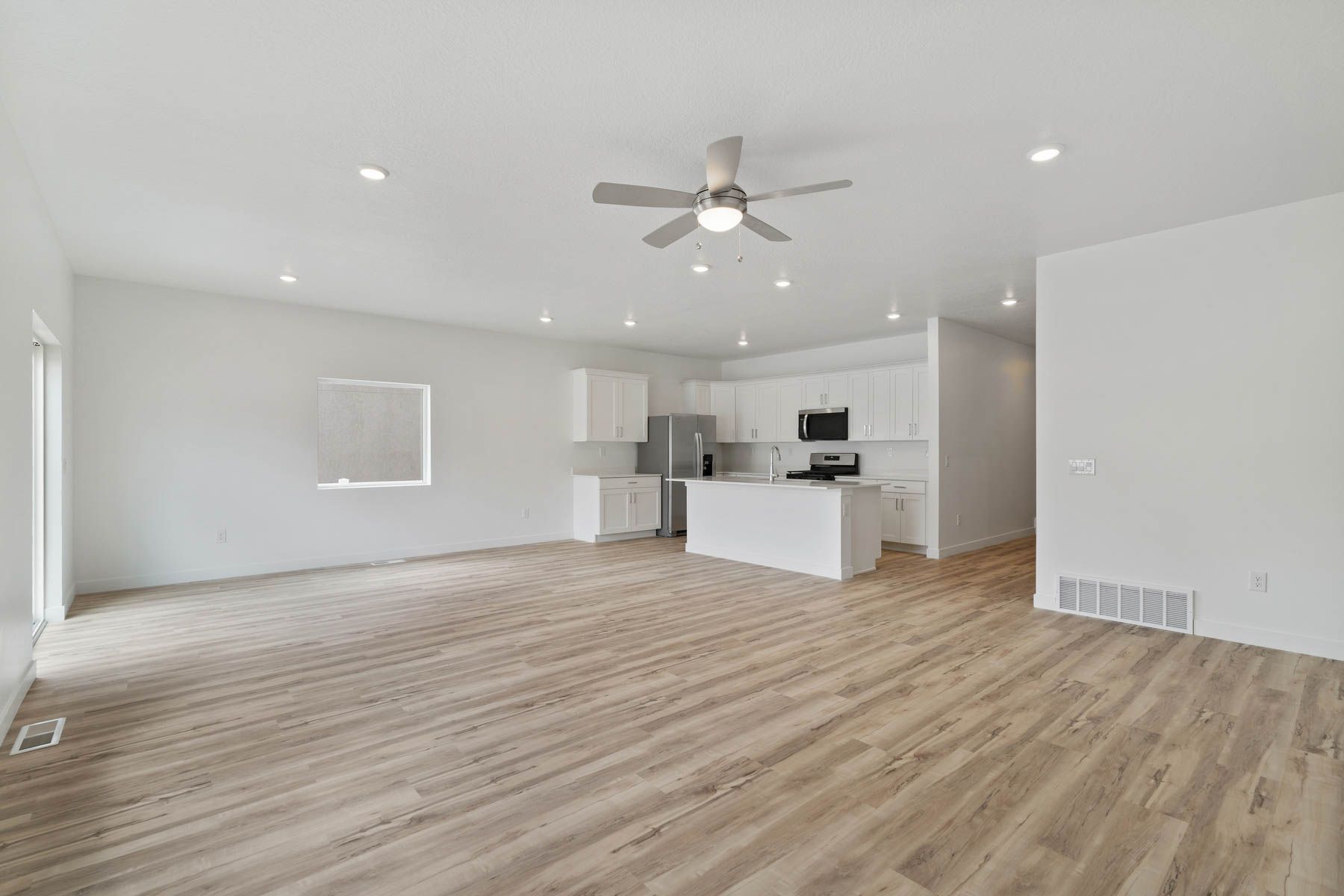 The open living spaces have large windows that let in great, natural light. 