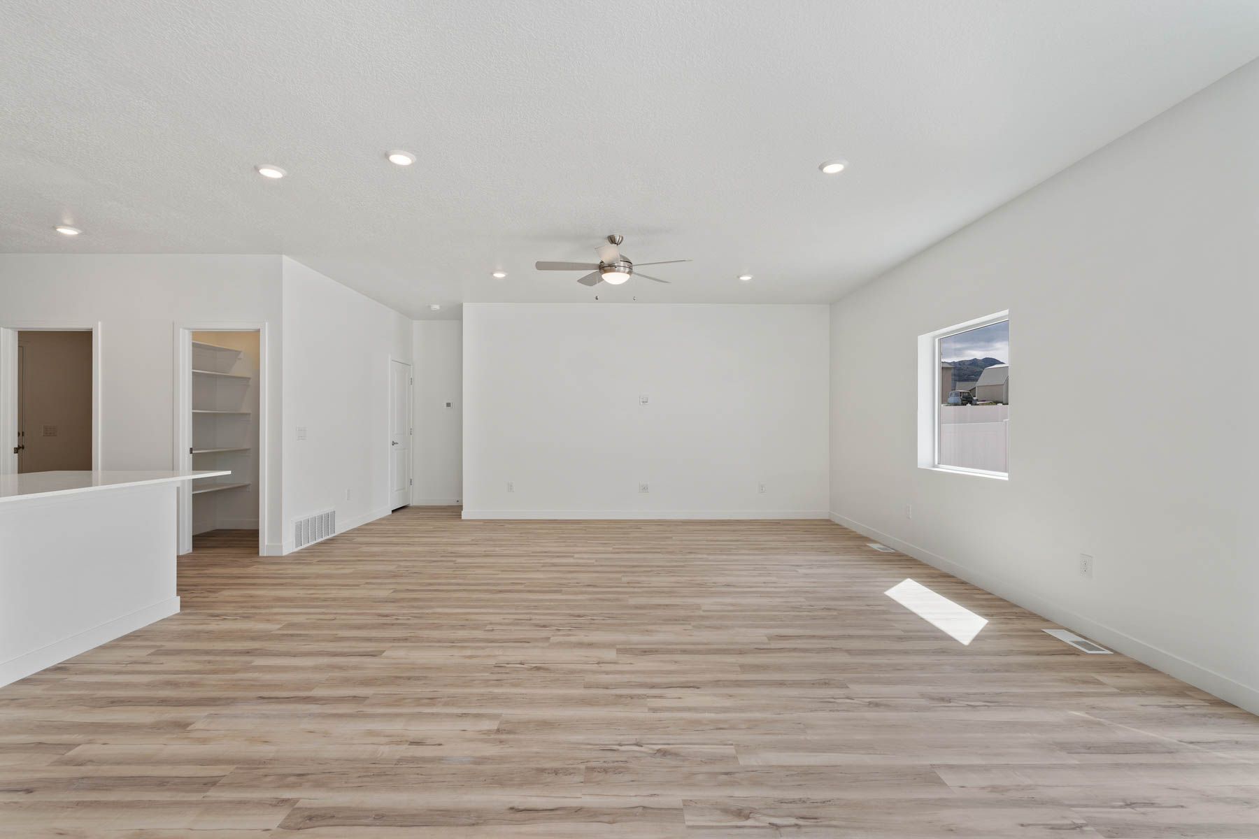 The dining room and family room are spacious and perfect for hosting. 