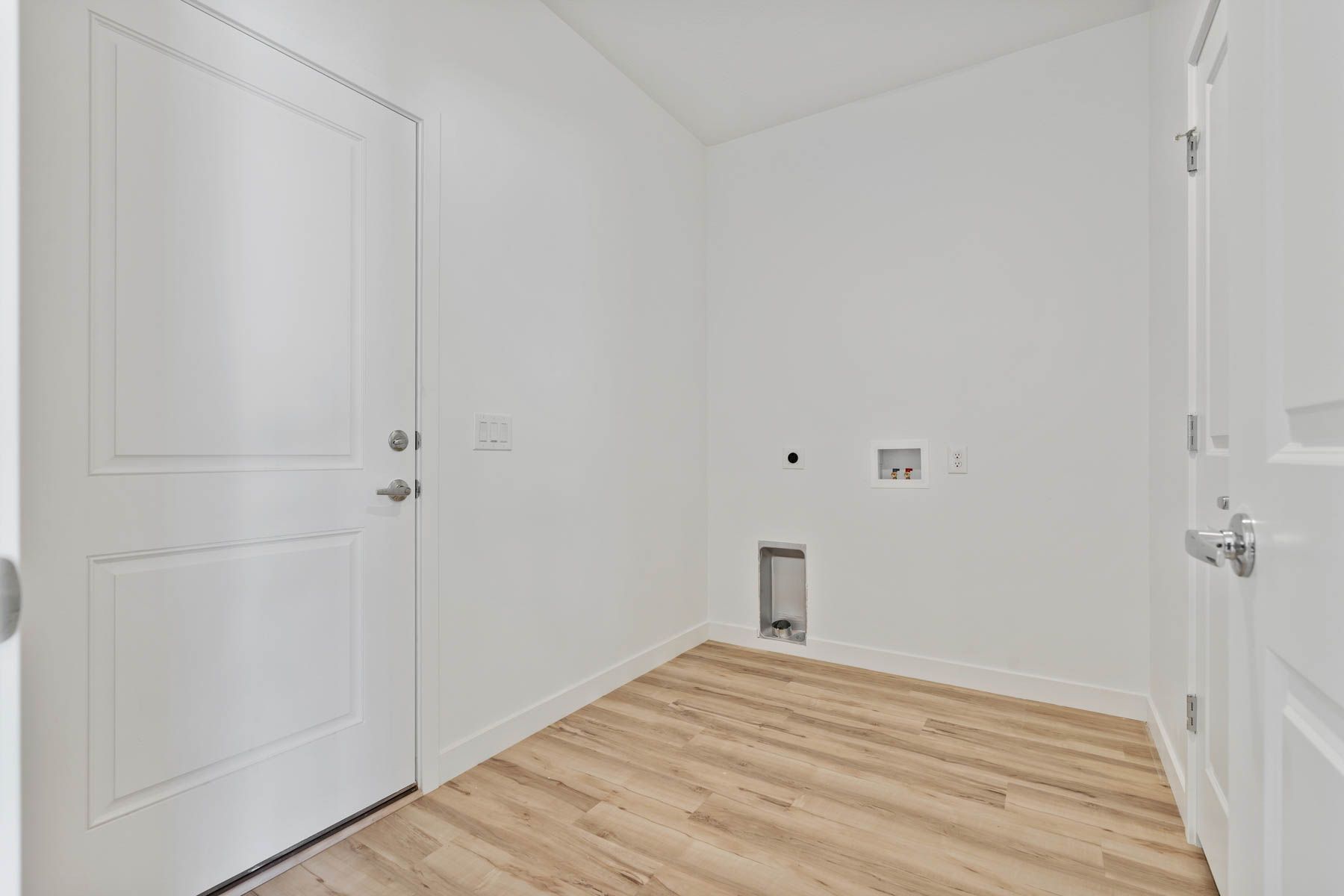 The laundry room is spacious. 