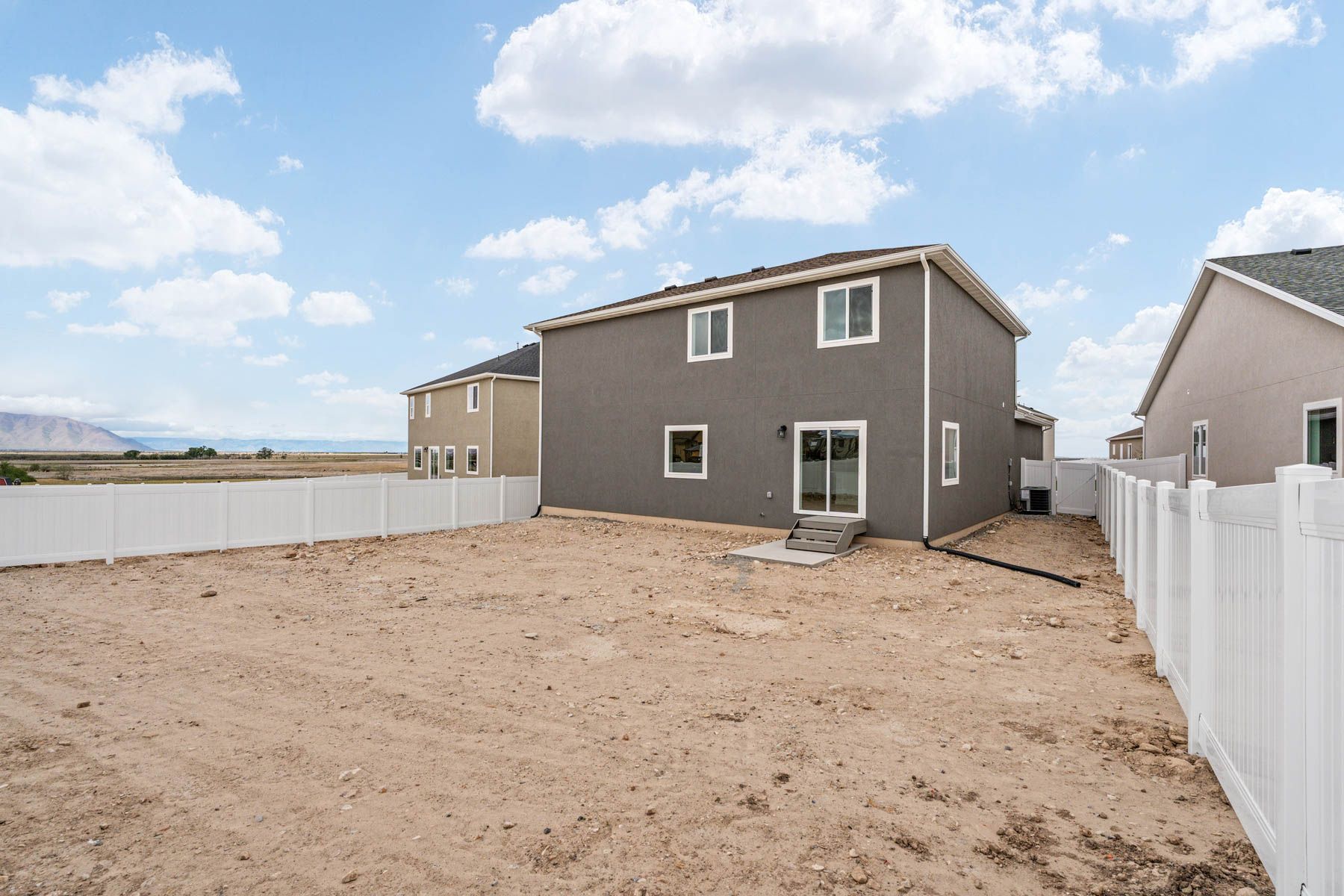 The Granite  has a fullly fenced-in back yard. 