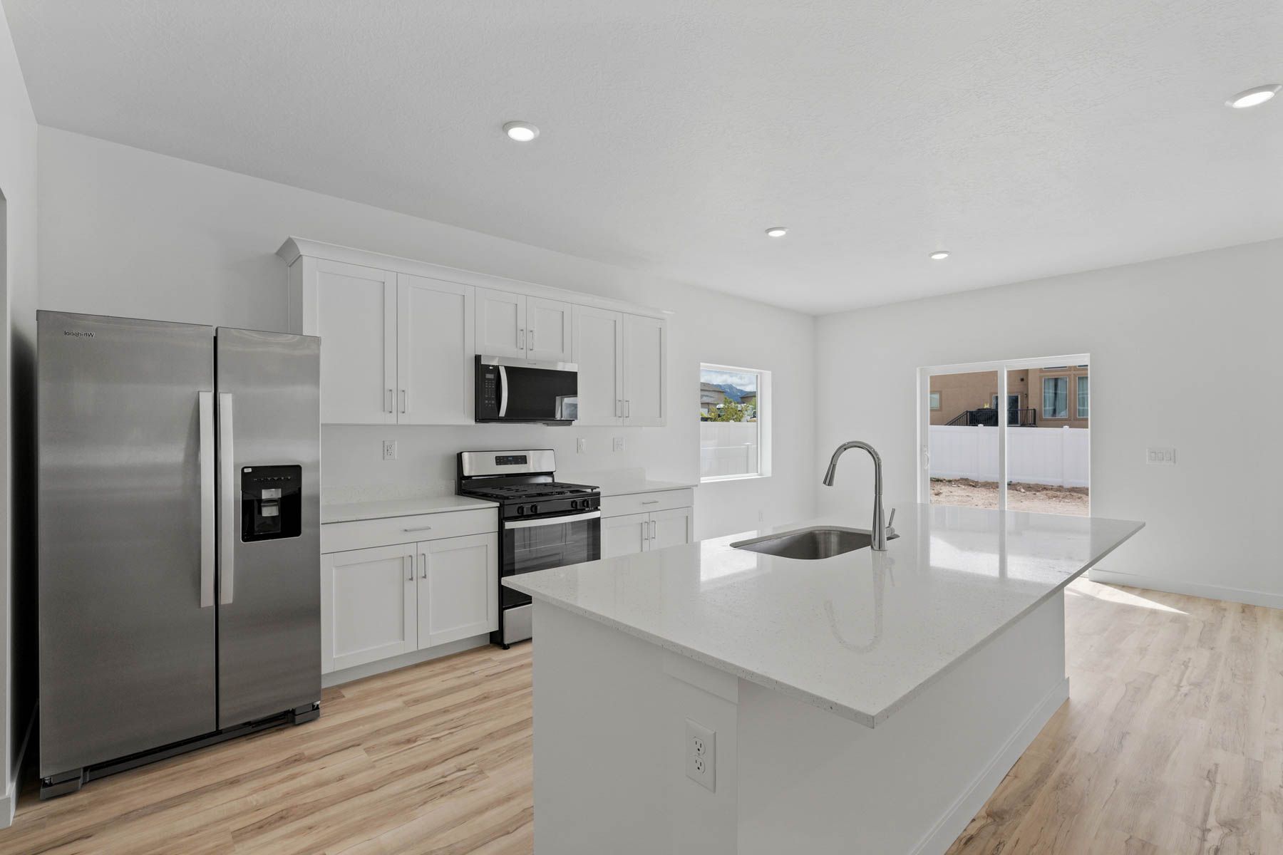 The kitchen has a wonderful kitchen island. 
