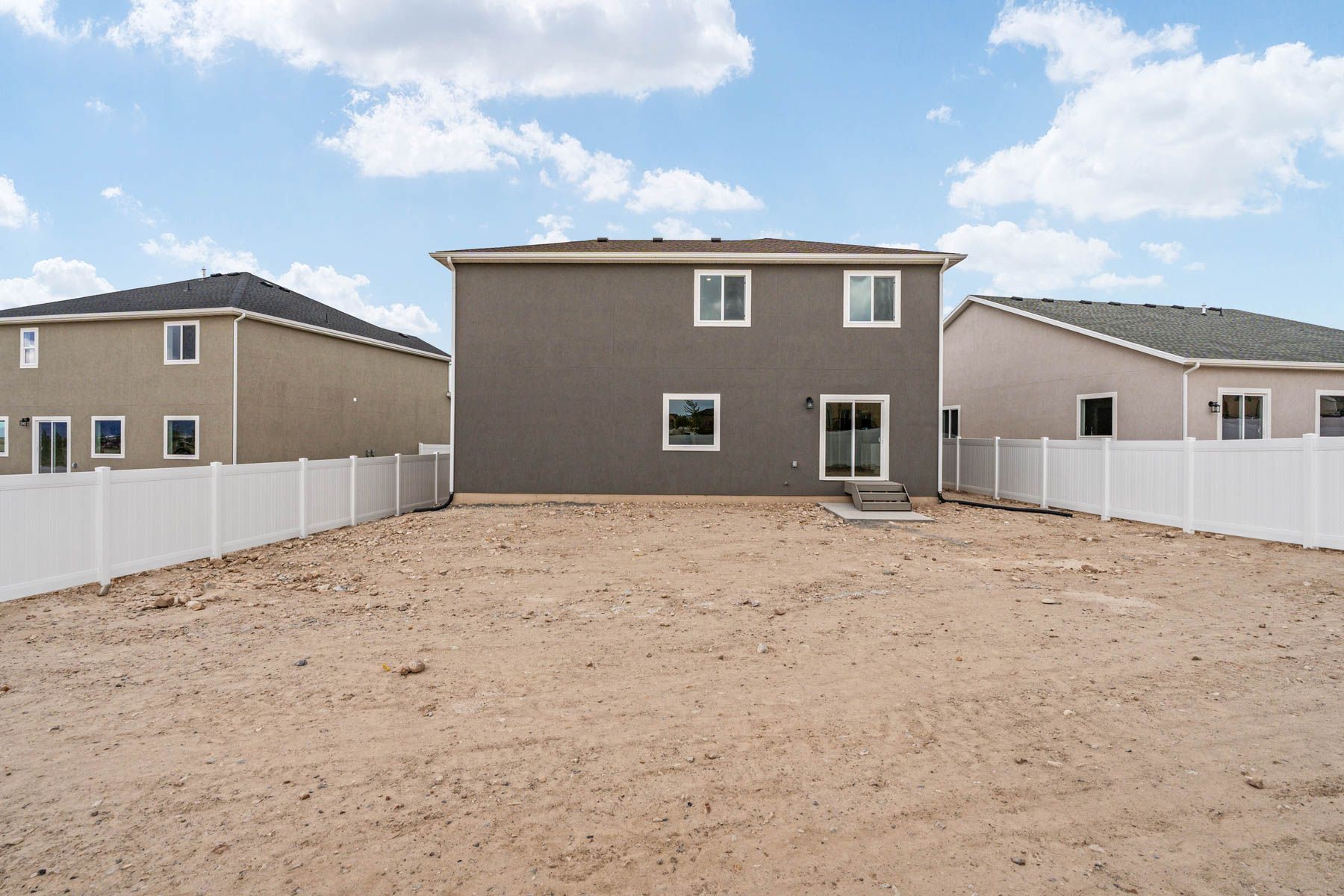 The Granite  has a fullly fenced-in back yard. 