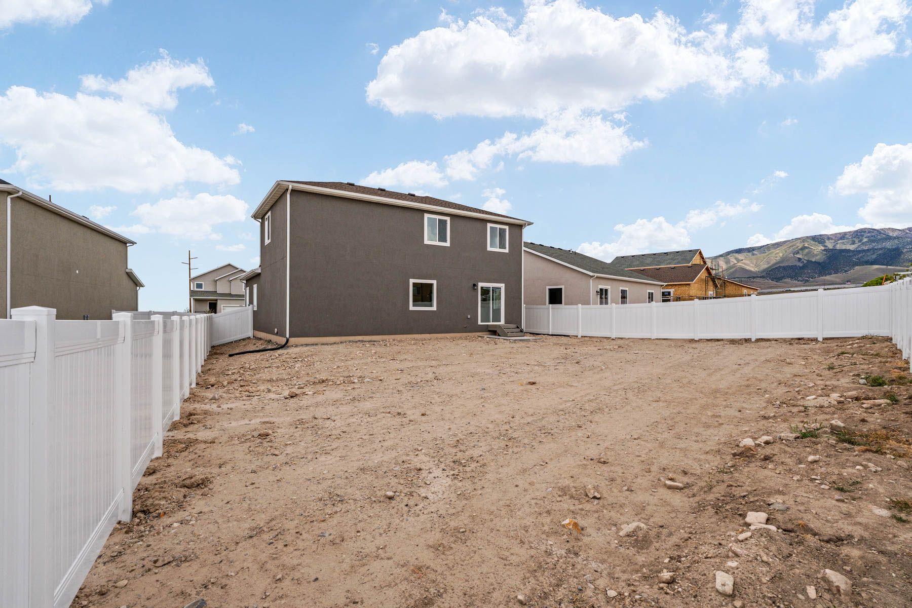 The Granite  has a fullly fenced-in back yard. 