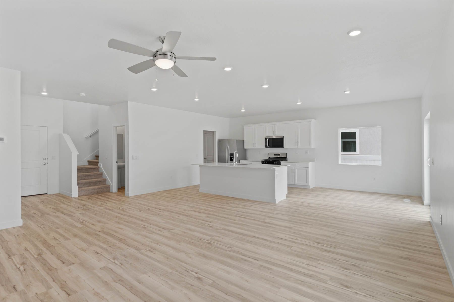 The family room is spacious for lots of furniture.