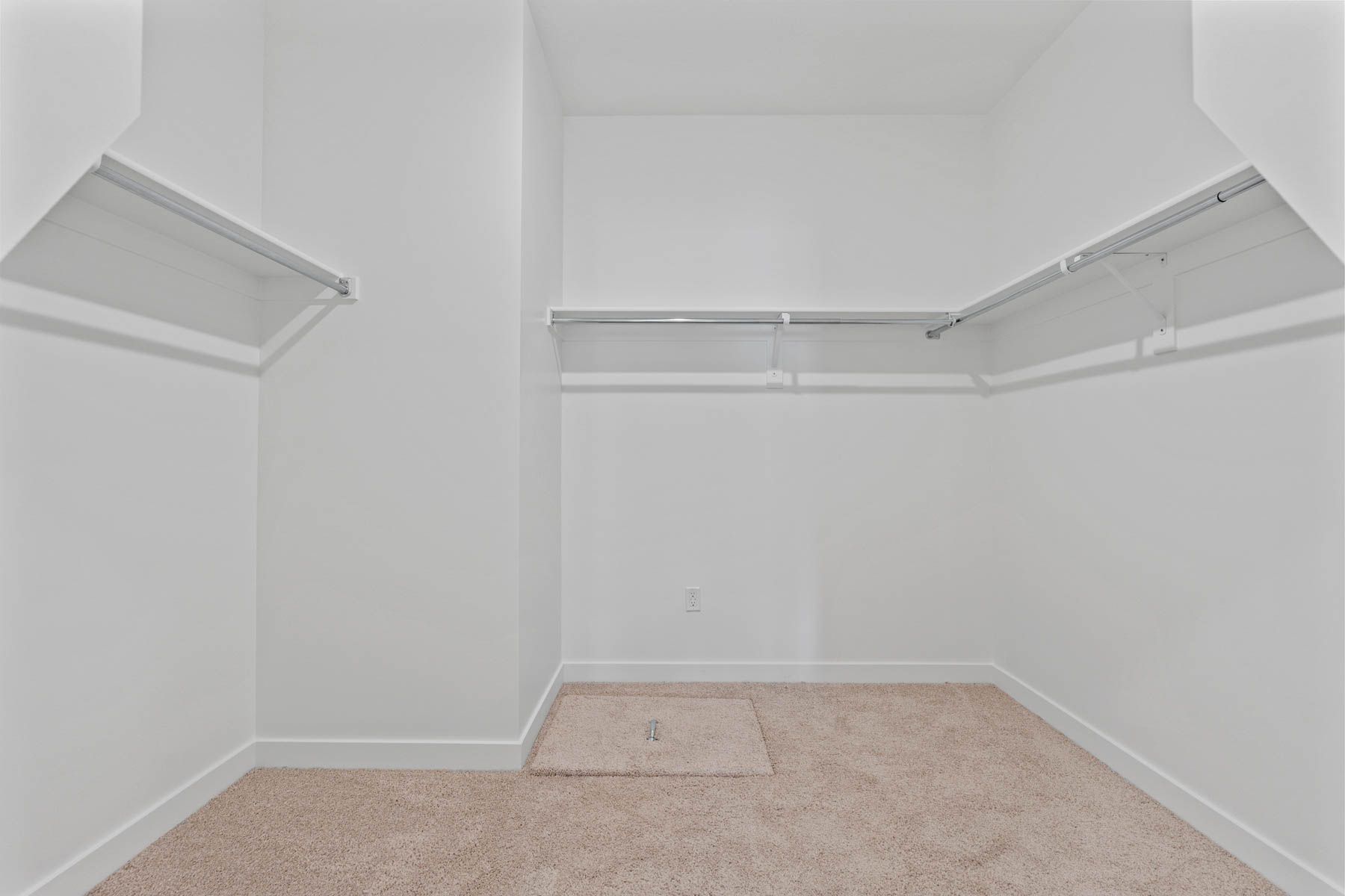 The walk-in closet is the perfect place to store clothes, shoes, and other personal belongings. 