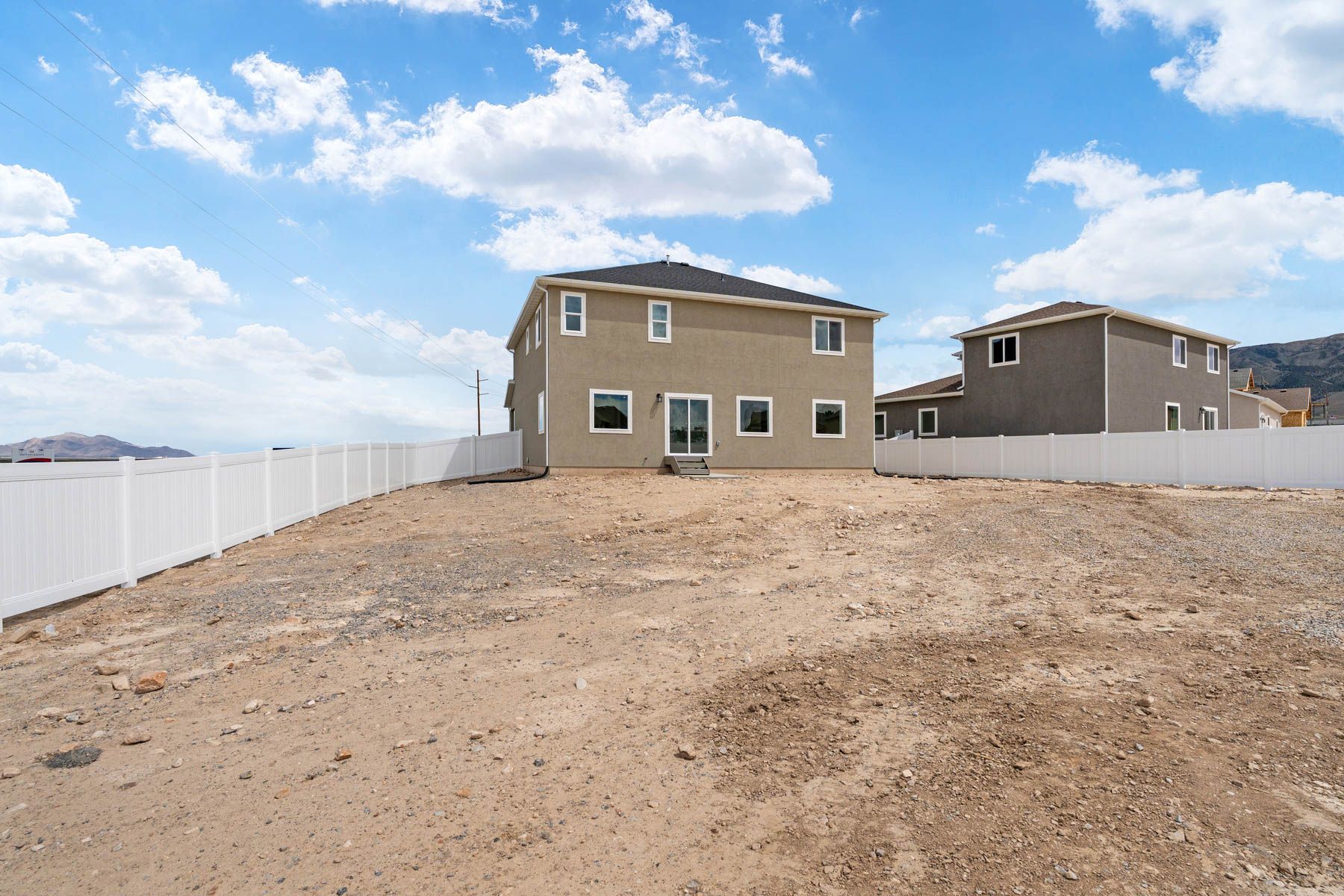 The Red Rock has a fullly fenced-in back yard. 