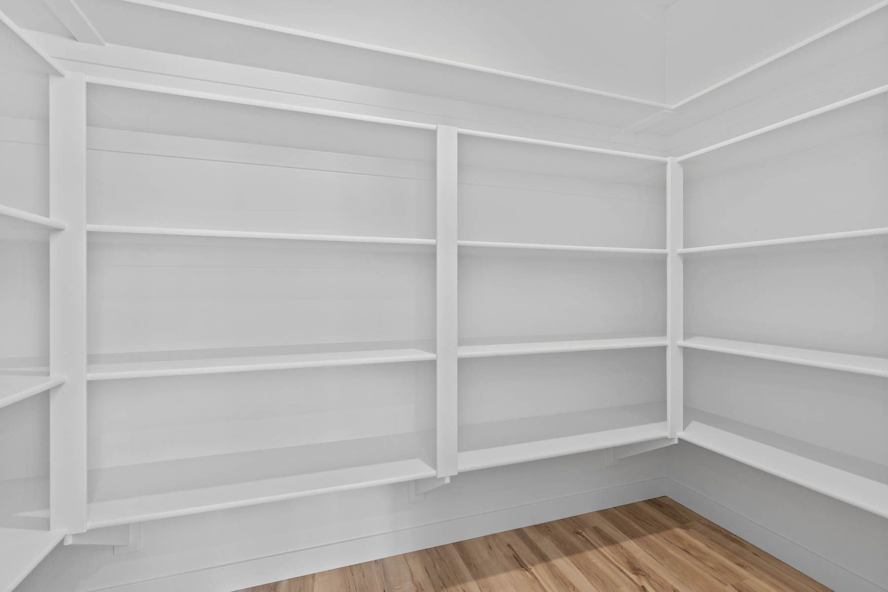 The kitchen has a wonderful walk-in pantry that has plenty of storage space.
